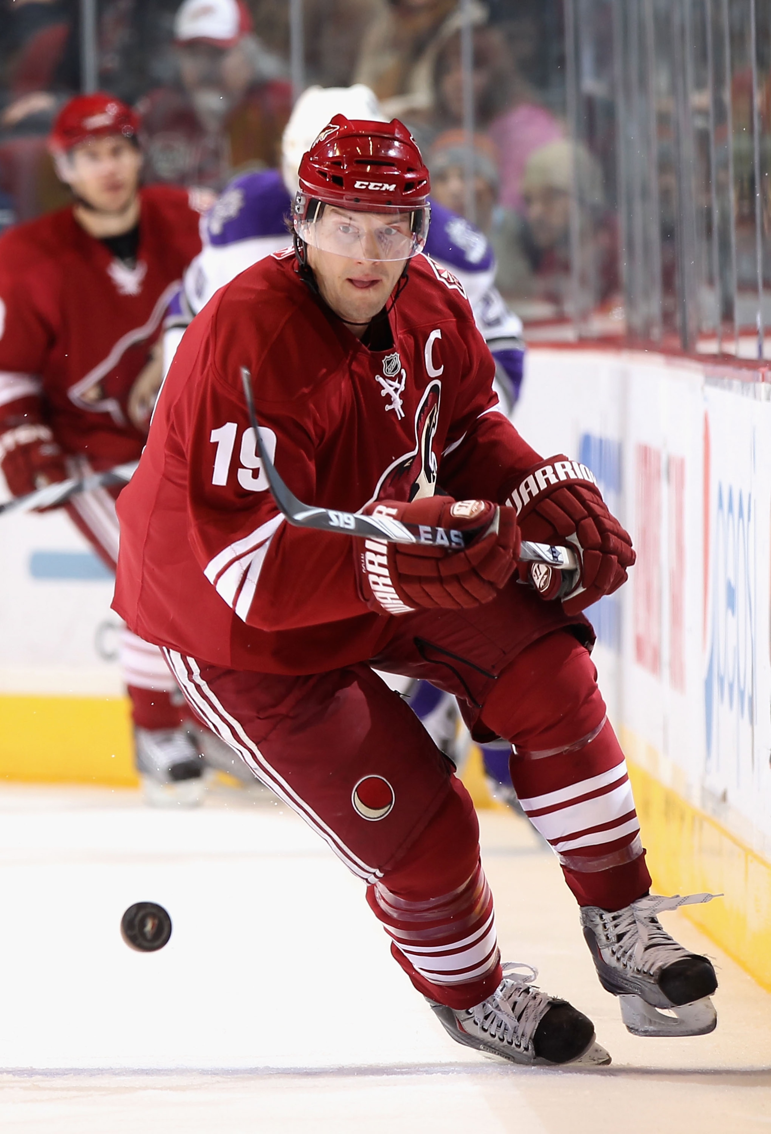 GLENDALE, AZ - DECEMBER 29:  Shane Doan #19 of the Phoenix Coyotes skates with the puck during the NHL game against the Los Angeles Kings at Jobing.com Arena on December 29, 2010 in Glendale, Arizona.  The Coyotes defeated the Kings 6-3.  (Photo by Christ