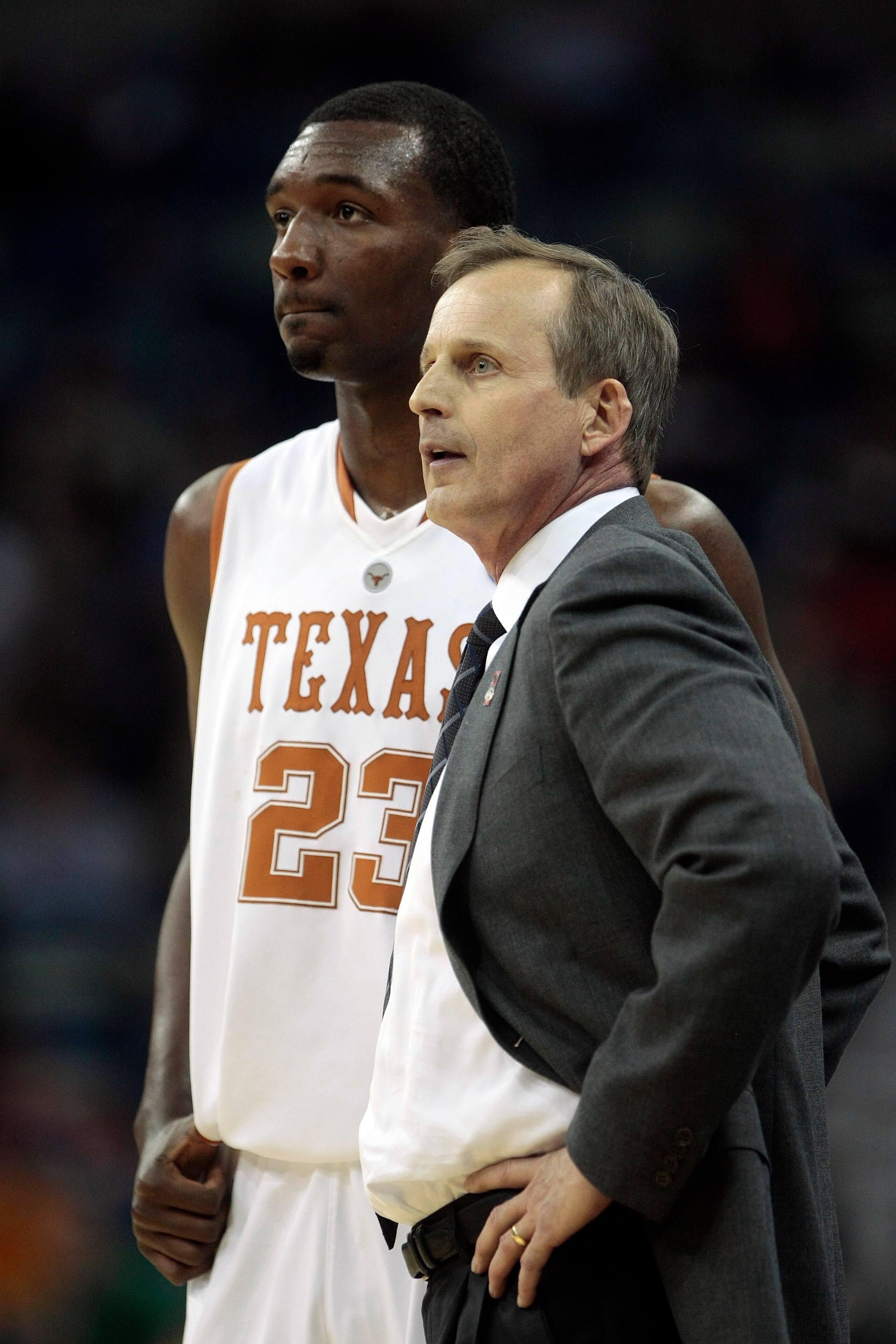 NEW ORLEANS - MARCH 18: Coach Rick Barnes of the Texas Longhorns talks with player Jordan Hamilton #23 near the end of an 81-80 loss to the Wake Forest Demon Deacons during the first round of the 2010 NCAA mens basketball tournament at the New Orleans Are