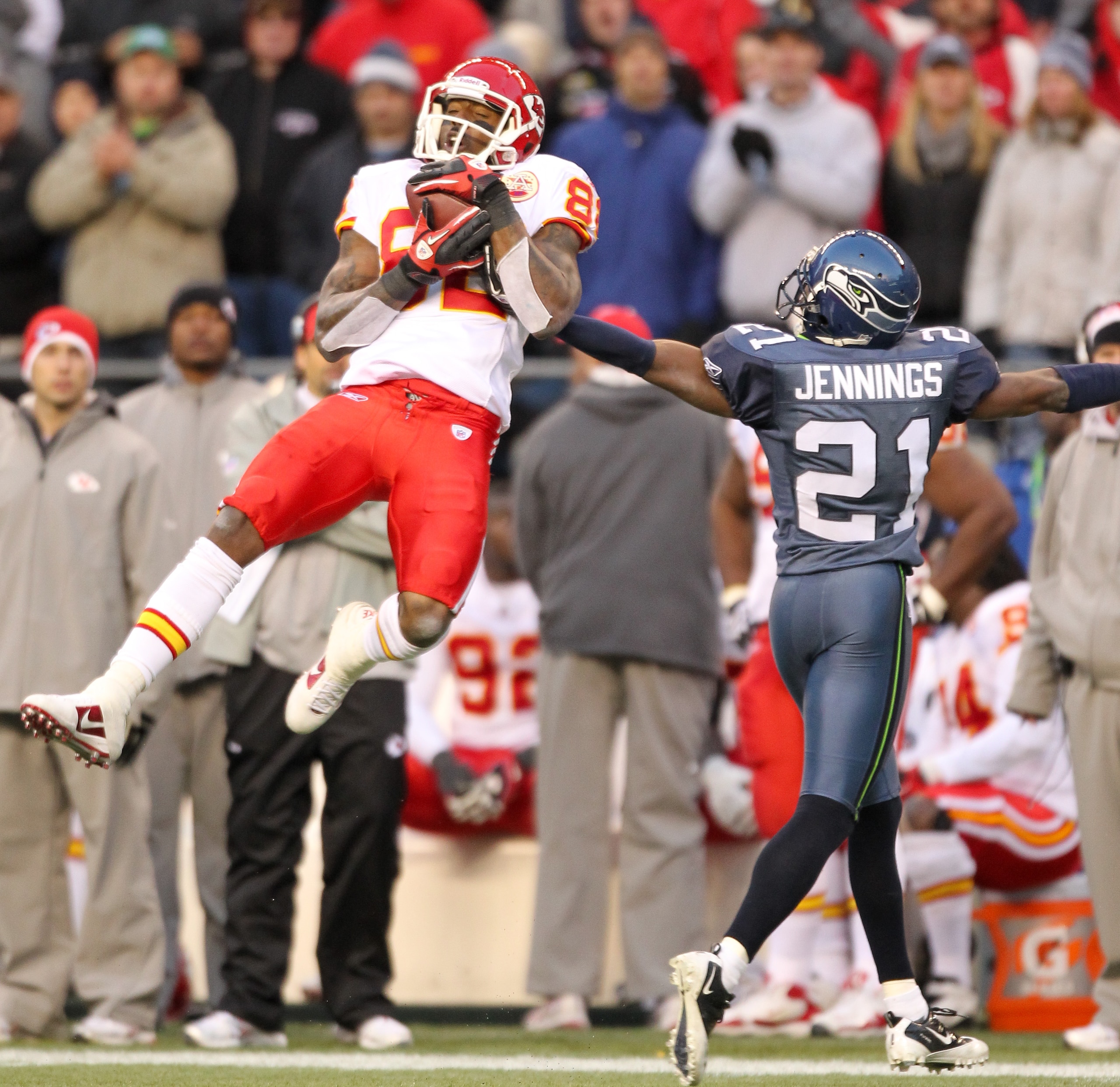 SEATTLE, WA - NOVEMBER 28:  Wide receiver Dwayne Bowe #82 of the Kansas City Chiefs makes a catch for a first down with under six minutes to go against Kelly Jennings #21 of the Seattle Seahawks at Qwest Field on November 28, 2010 in Seattle, Washington.
