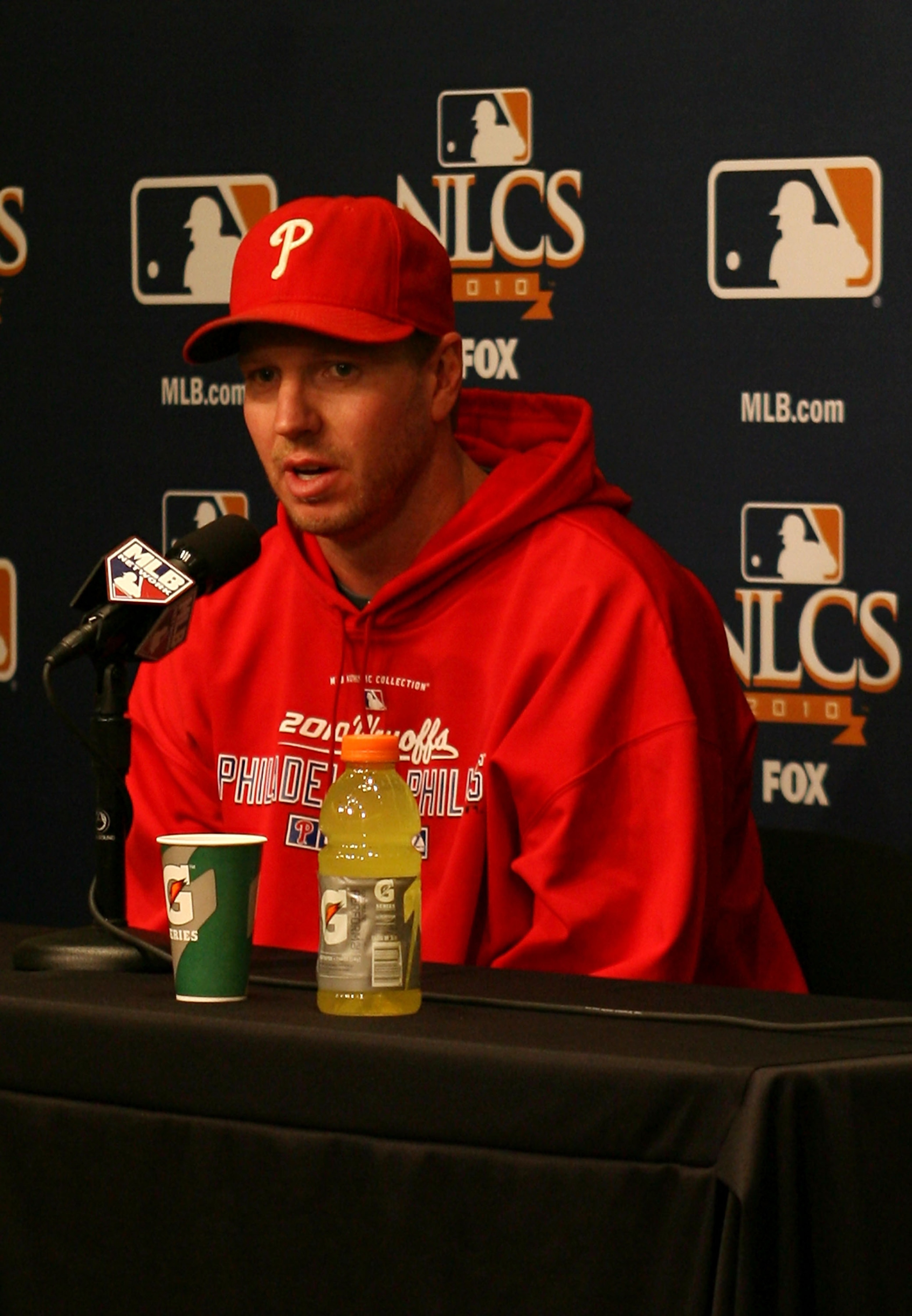 SAN FRANCISCO - OCTOBER 20:  Pitcher Roy Halladay #34 of the Philadelphia Phillies addresses the media before Game Four of the NLCS during the 2010 MLB Playoffs at AT&T Park on October 20, 2010 in San Francisco, California. Halladay is scheduled to pitch