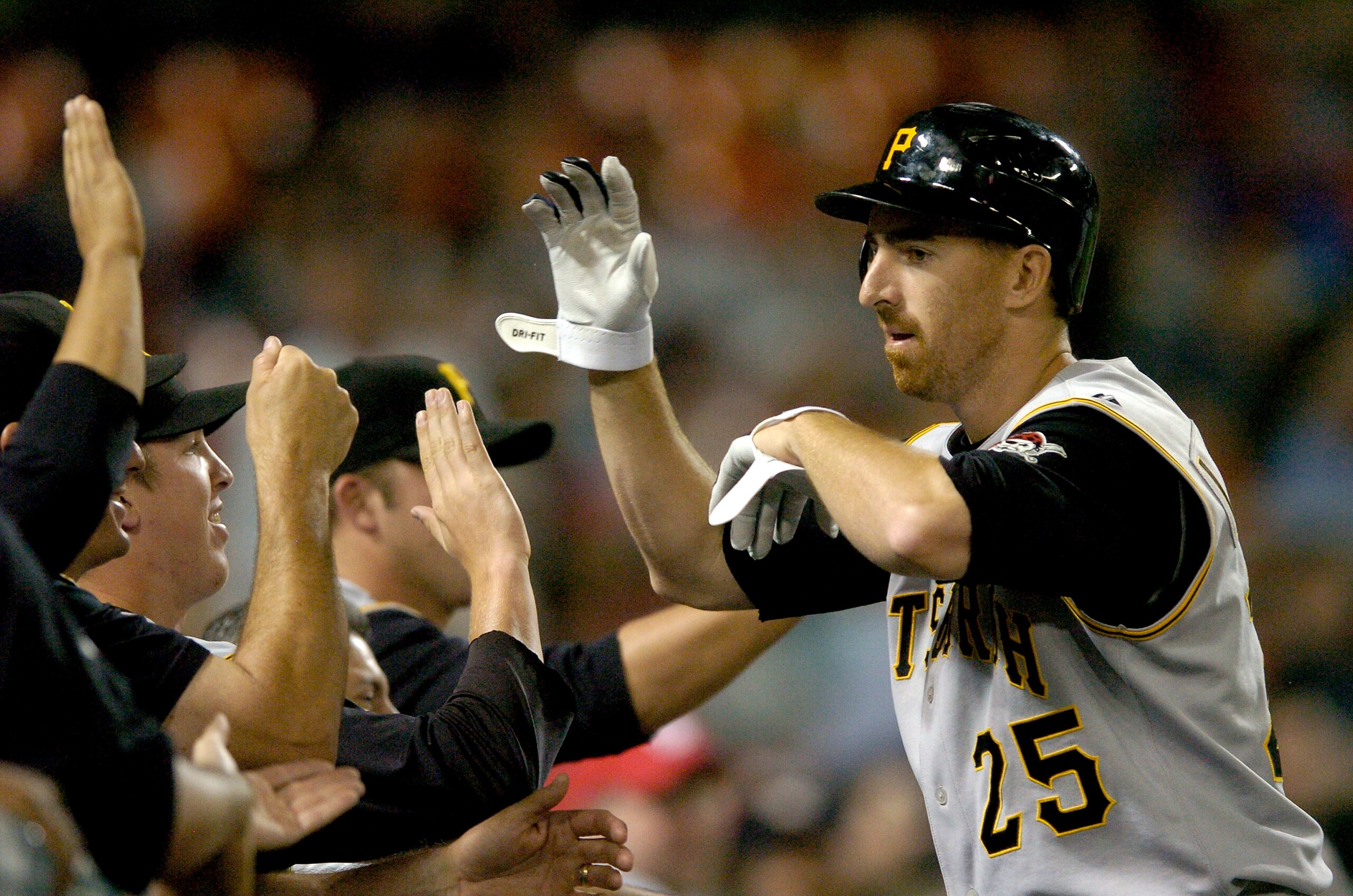 WASHINGTON - JUNE 6: Adam LaRoche #25 of the Pittsburgh Pirates is congratulated by teammates after hitting a three-run home run in the eighth inning against the Washington Nationals at RFK Stadium June 6, 2007 in Washington, DC. (Photo by Greg Fiume/Ge WASHINGTON - JUNE 6: Adam LaRoche #25 of the Pittsburgh Pirates is congratulated by teammates after hitting a three-run home run in the eighth inning against the Washington Nationals at RFK Stadium June 6, 2007 in Washington, DC. (Photo by Greg Fiume/Ge