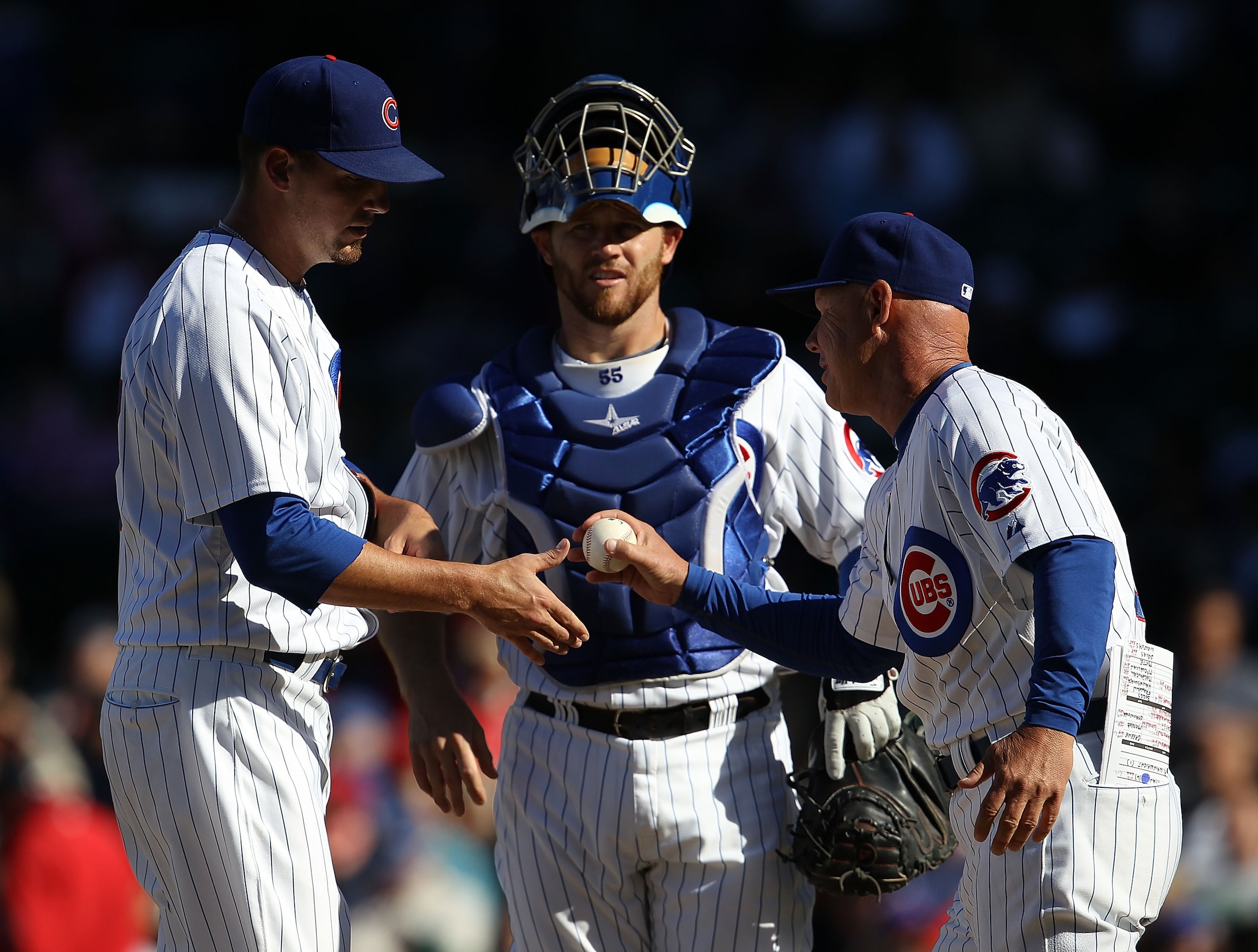 CHICAGO - SEPTEMBER 24: Interim manager Mike Quade #8 of the Chicago Cubs takes pitcher Scott Maine #57 out of a game against the St. Louis Cardinals as Koyie Hill #55 watches at Wrigley Field on September 24, 2010 in Chicago, Illinois. The CArdinals defe CHICAGO - SEPTEMBER 24: Interim manager Mike Quade #8 of the Chicago Cubs takes pitcher Scott Maine #57 out of a game against the St. Louis Cardinals as Koyie Hill #55 watches at Wrigley Field on September 24, 2010 in Chicago, Illinois. The CArdinals defe