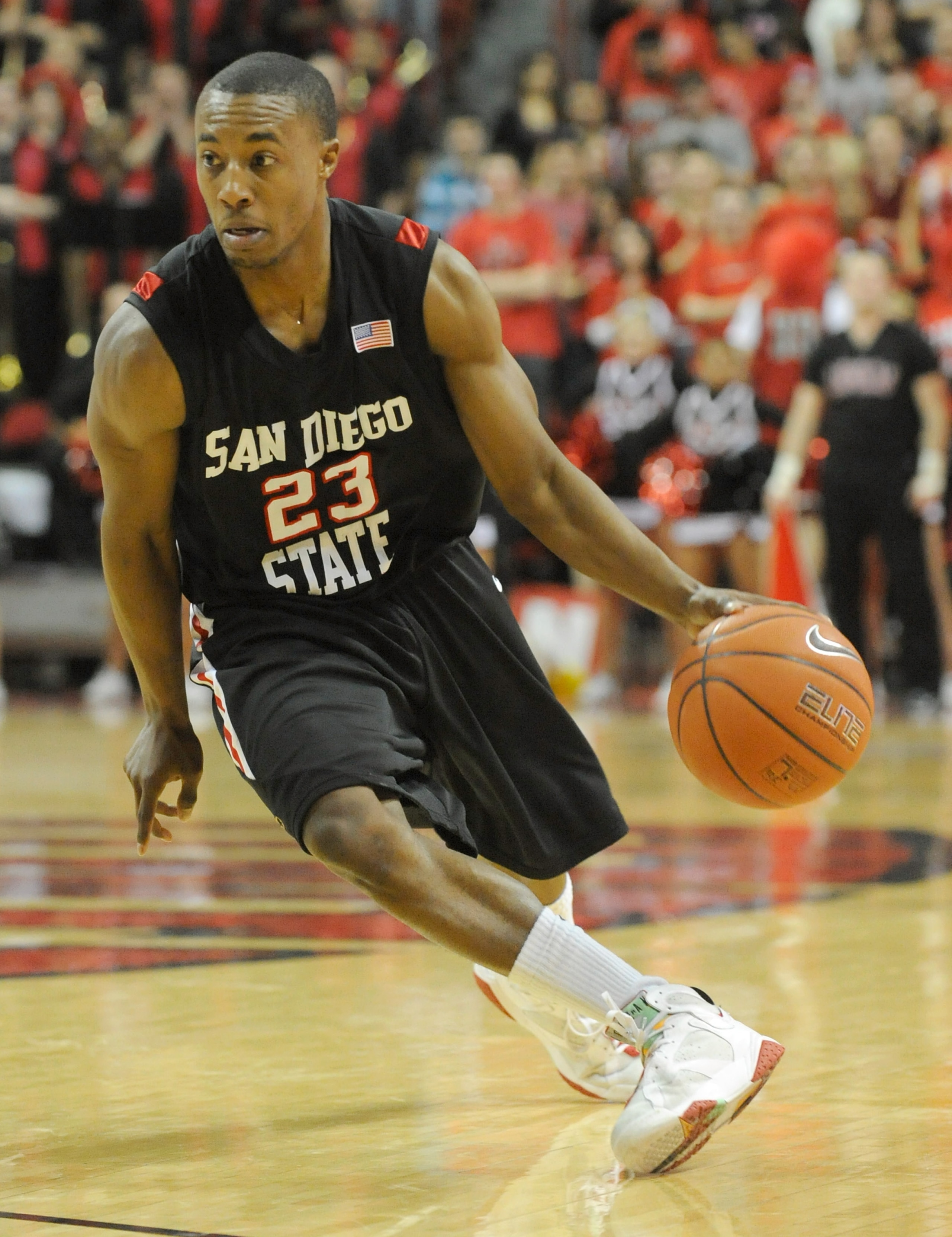 LAS VEGAS - JANUARY 13:  D.J. Gay #23 of the San Diego State Aztecs brings the ball up the court during a game against the UNLV Rebels at the Thomas & Mack Center January 13, 2009 in Las Vegas, Nevada. The Rebels defeated the Aztecs 76-66.  (Photo by Etha