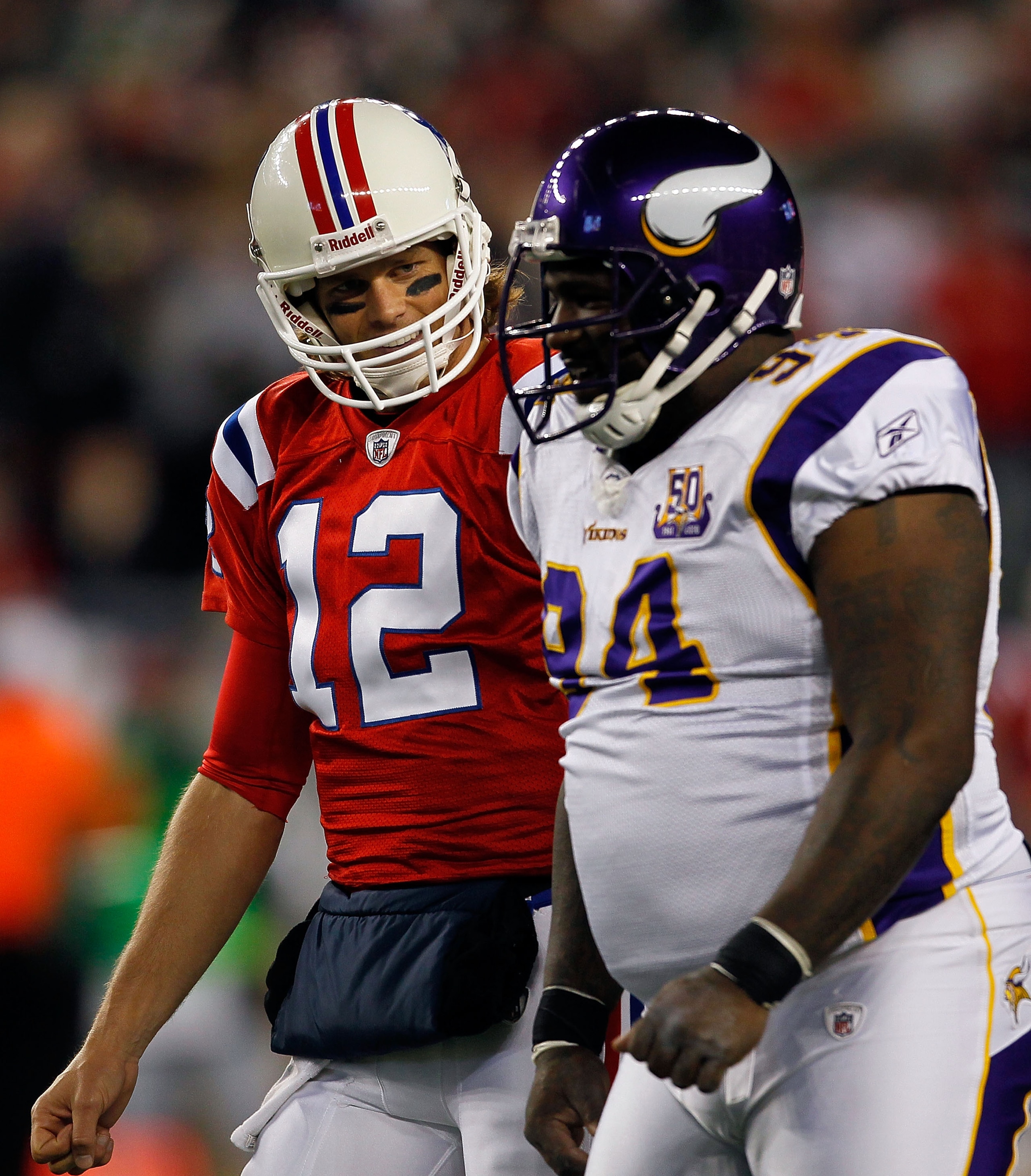 FOXBORO, MA - OCTOBER 31:  Tom Brady #12 of New England Patriots has words with Pat Williams #94 of the Minnesota Vikings at Gillette Stadium on October 31, 2010 in Foxboro, Massachusetts. (Photo by Jim Rogash/Getty Images)
