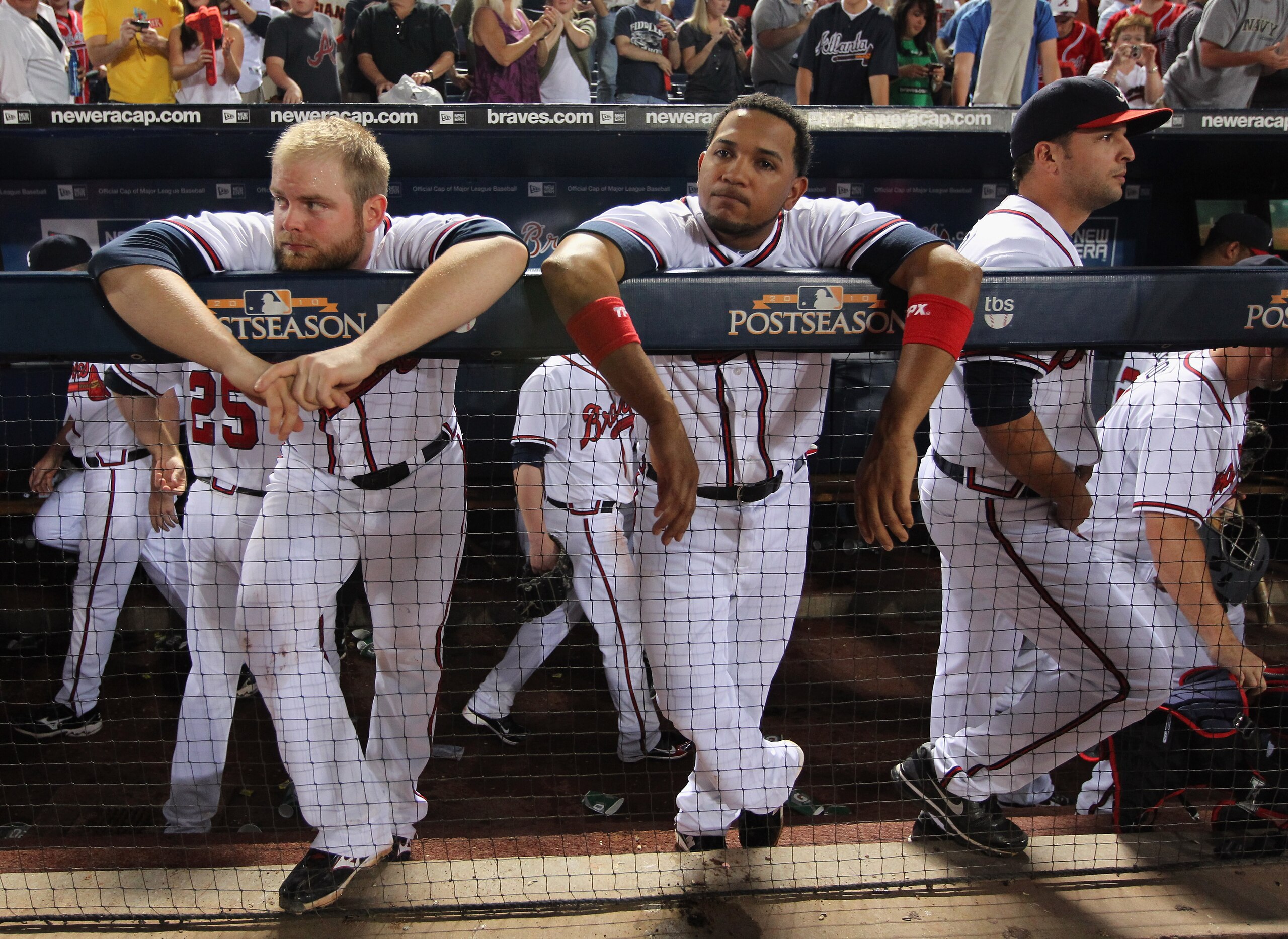 ATLANTA - OCTOBER 11: Brian McCann #16, Diory Hernandez #19 and Martin Prado of the Atlanta Braves react after the San Francisco Giants defeated the Braves 3-2 to win Game Four of the NLDS of the 2010 MLB Playoffs on October 11, 2010 at Turner Field in ATLANTA - OCTOBER 11: Brian McCann #16, Diory Hernandez #19 and Martin Prado of the Atlanta Braves react after the San Francisco Giants defeated the Braves 3-2 to win Game Four of the NLDS of the 2010 MLB Playoffs on October 11, 2010 at Turner Field in