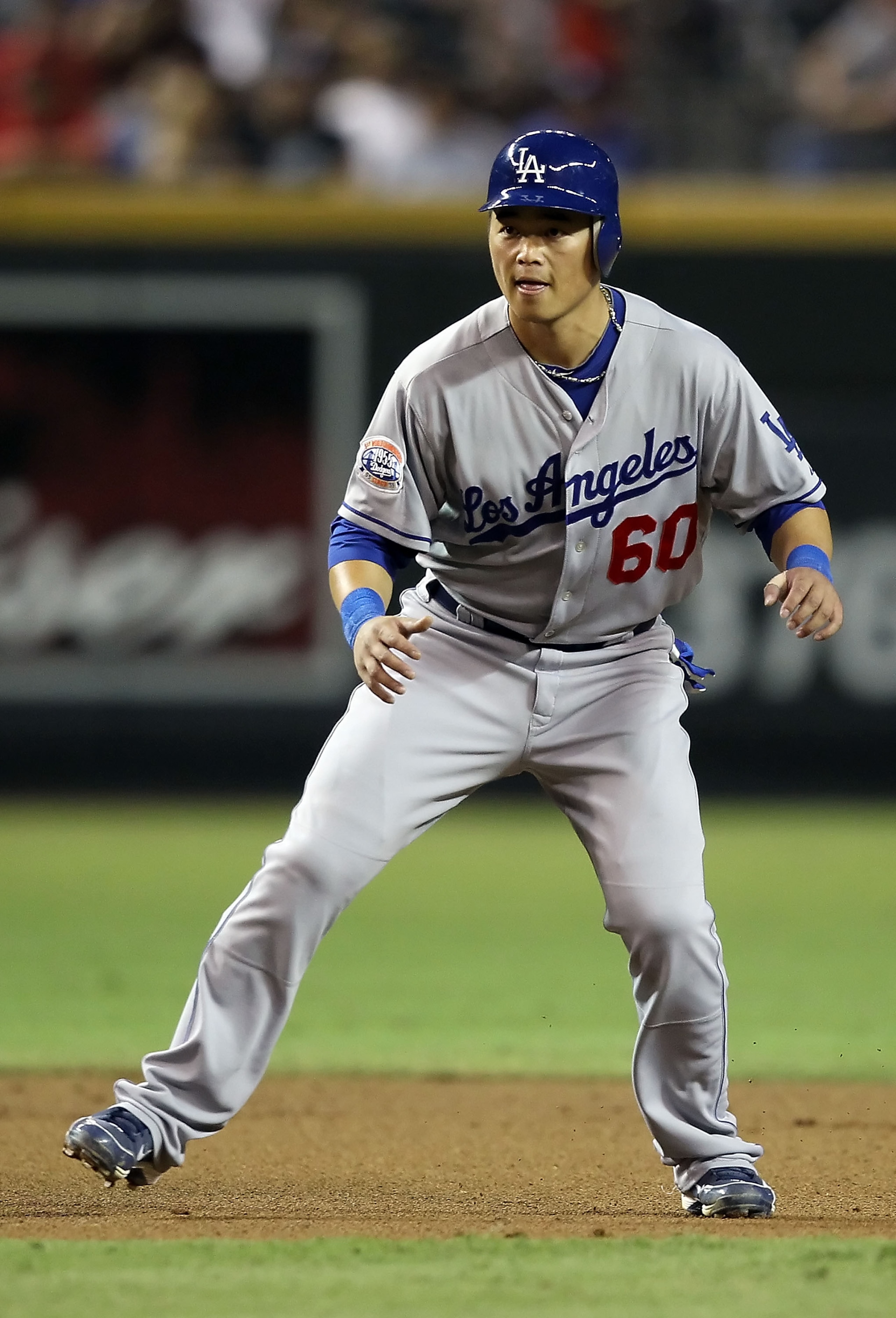 PHOENIX - SEPTEMBER 24: Chin-lung Hu #60 of the Los Angeles Dodgers leads off second base during the Major League Baseball game against the Arizona Diamondbacks at Chase Field on September 24, 2010 in Phoenix, Arizona. The Dodgers defeated the Diamondba PHOENIX - SEPTEMBER 24: Chin-lung Hu #60 of the Los Angeles Dodgers leads off second base during the Major League Baseball game against the Arizona Diamondbacks at Chase Field on September 24, 2010 in Phoenix, Arizona. The Dodgers defeated the Diamondba