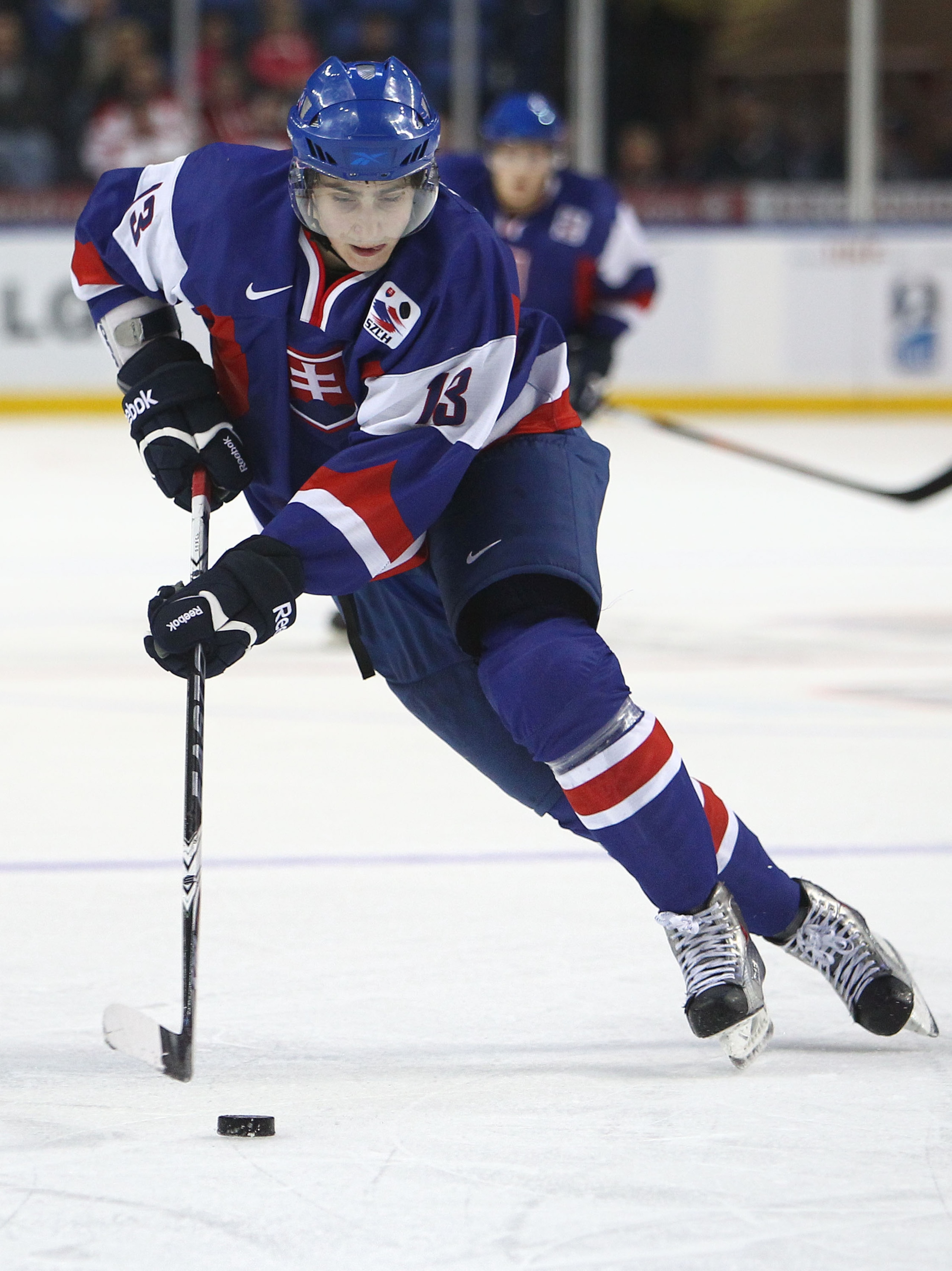 BUFFALO, NY - DECEMBER 31: Forward Tomas Jurco #13 of Slovakia carries the puck during the 2011 IIHF World U20 Championship game between Slovakia and Finland on December 31, 2010 at HSBC Arena in Buffalo, New York. (Photo by Tom Szczerbowski/Getty Images)