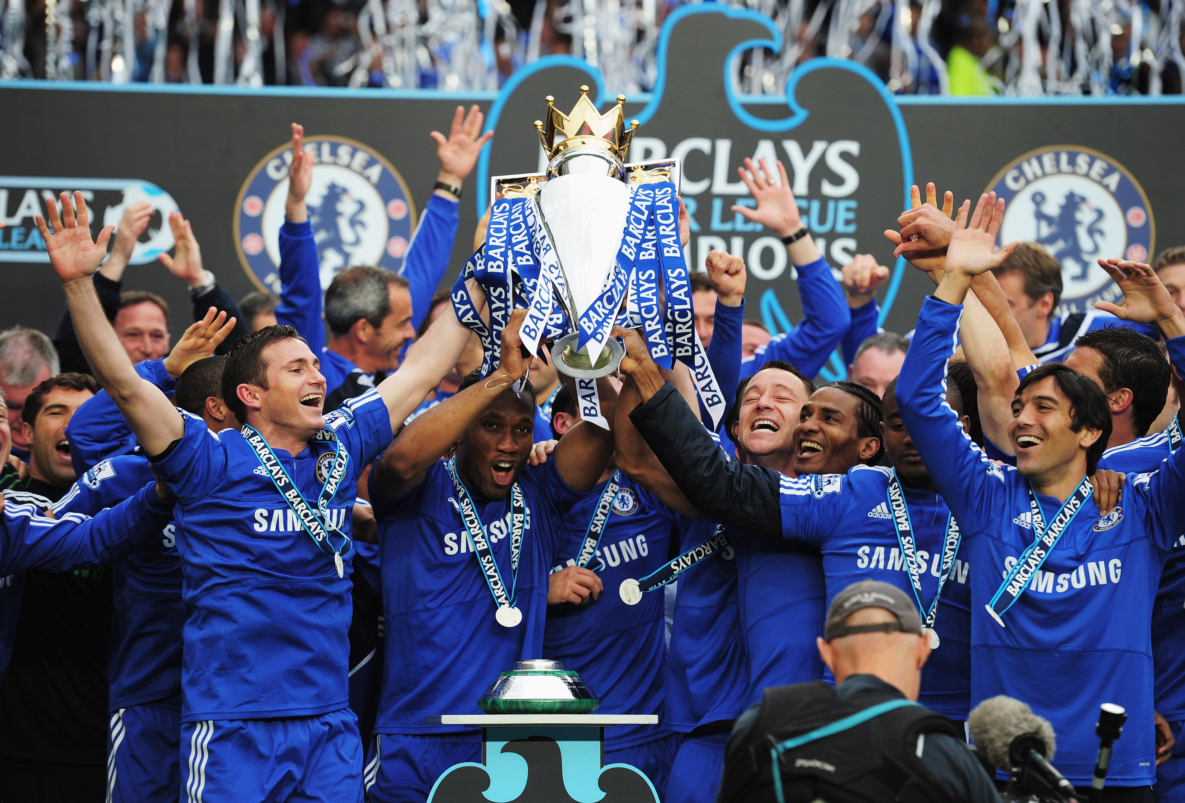 LONDON, ENGLAND - MAY 09:  John Terry and Frank Lamaprd of Chelse lift the trophy after the Barclays Premier League match between Chelsea and Wigan Athletic at Stamford Bridge on May 9, 2010 in London, England. Chelsea won 8-0 to win the title.  (Photo by