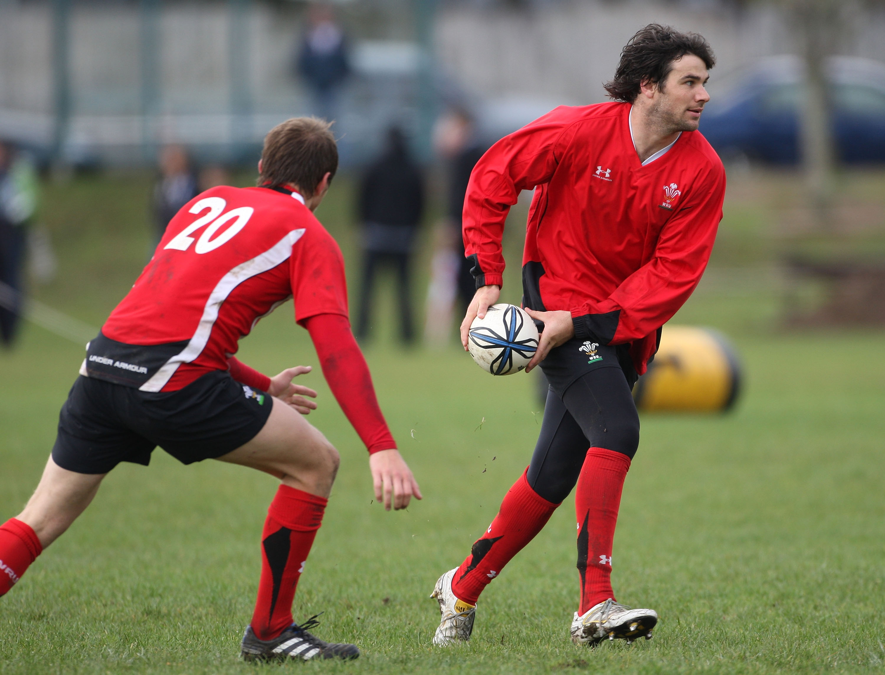 HAMILTON, NEW ZEALAND - JUNE 23: Mike Phillips of Wales looks to pass the ball during a Wales training session at Hamilton Boys High School on June 23, 2010 in Hamilton, New Zealand. (Photo by Sandra Mu/Getty Images)