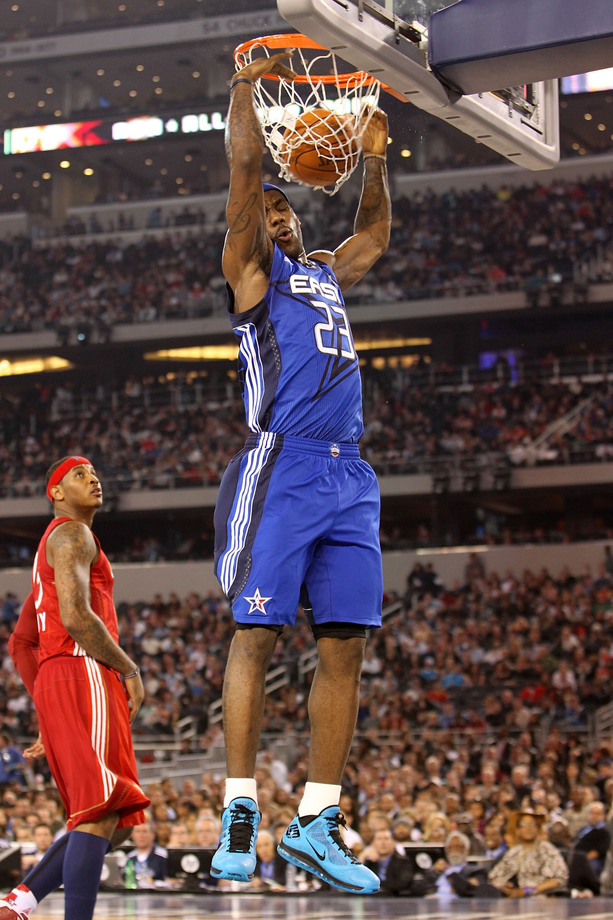 ARLINGTON, TX - FEBRUARY 14:  LeBron James #23 of the Eastern Conference dunks against Carmelo Anthony #15 of the Western Conference during the third quarter of the NBA All-Star Game, part of 2010 NBA All-Star Weekend at Cowboys Stadium on February 14, 20