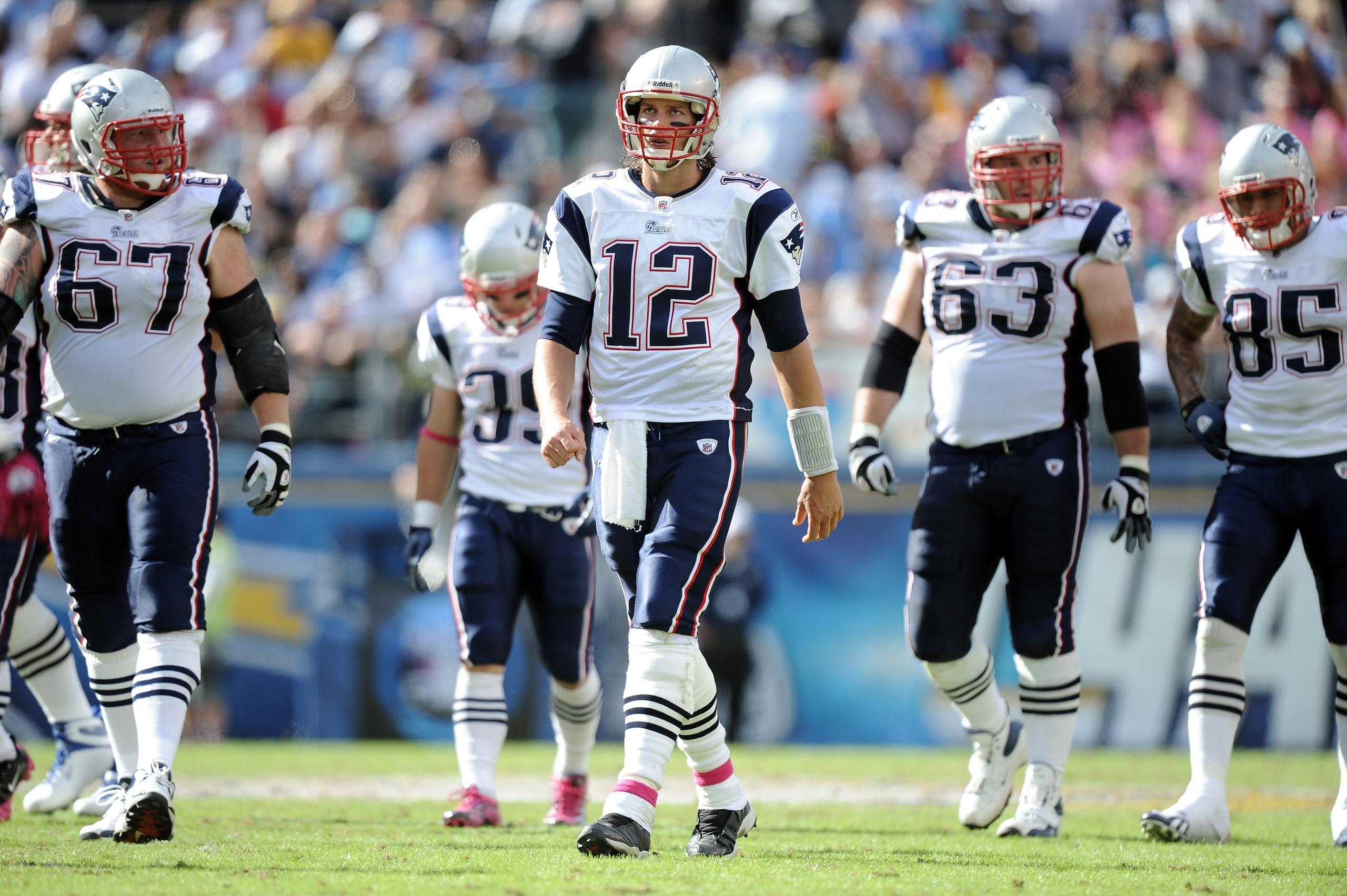 SAN DIEGO - OCTOBER 24:  Tom Brady #12 of the  New England Patriots leaves his teammates off the field against the San Diego Chargers at Qualcomm Stadium on October 24, 2010 in San Diego, California.  (Photo by Harry How/Getty Images)