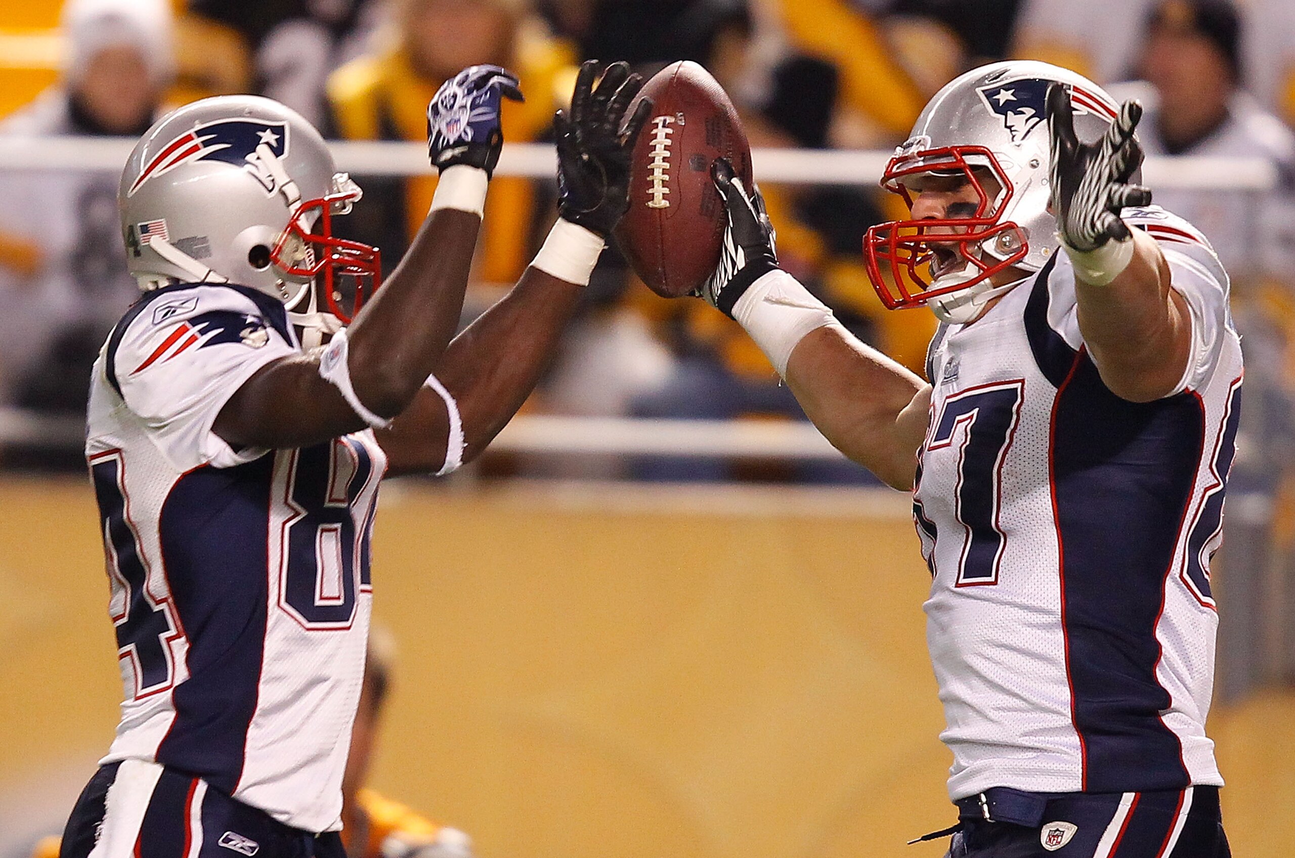 PITTSBURGH - NOVEMBER 14: Deion Branch #84 and Rob Gronkowski #87 of the New England Patriots celebrate after scoring a touchdown during the game against the Pittsburgh Steelers on November 14, 2010 at Heinz Field in Pittsburgh, Pennsylvania.  (Photo by J