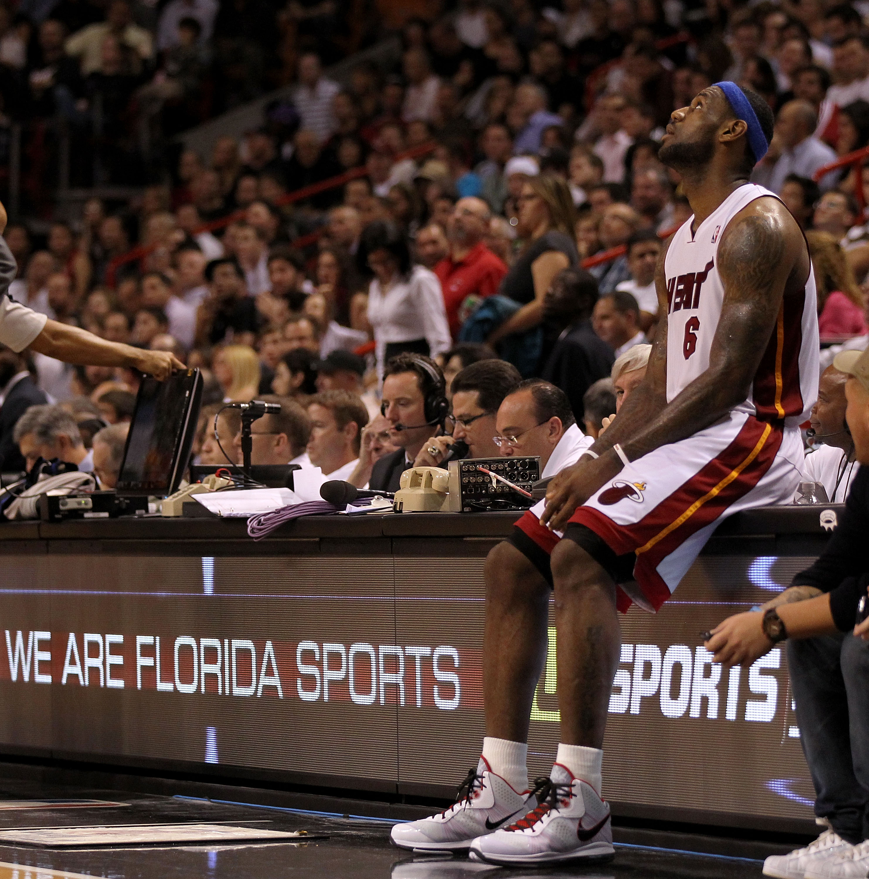 MIAMI, FL - JANUARY 04: LeBron James #6 of the Miami Heat waits on the scorers table during a game against the Milwaukee Bucks at American Airlines Arena on January 4, 2011 in Miami, Florida. NOTE TO USER: User expressly acknowledges and agrees that, by MIAMI, FL - JANUARY 04: LeBron James #6 of the Miami Heat waits on the scorers table during a game against the Milwaukee Bucks at American Airlines Arena on January 4, 2011 in Miami, Florida. NOTE TO USER: User expressly acknowledges and agrees that, by