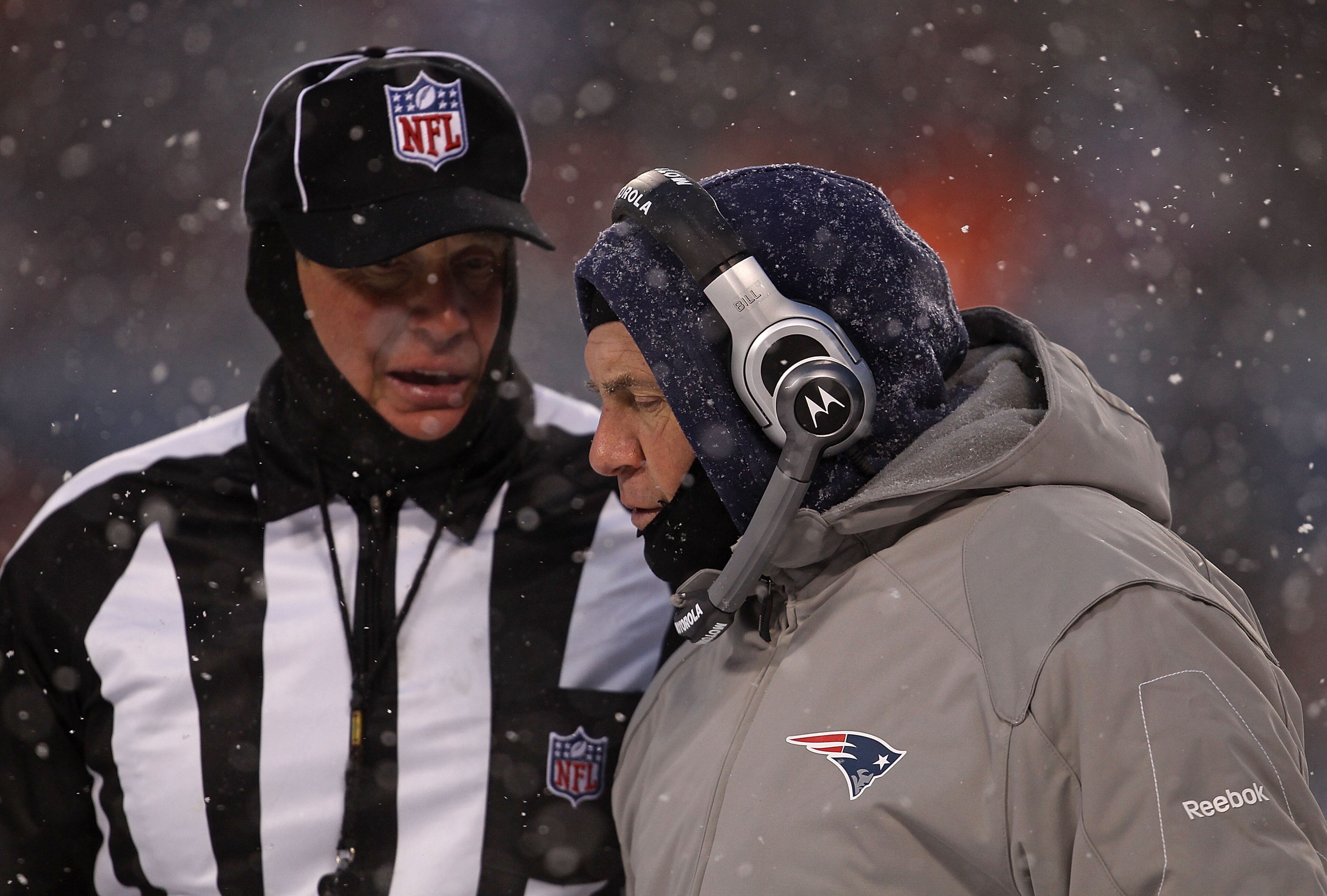 CHICAGO, IL - DECEMBER 12: Head coach Bill Belichick of the New England Patriots talks with a referee during a game against the Chicago Bears at Soldier Field on December 12, 2010 in Chicago, Illinois. The Patriots defeated the Bears 36-7. (Photo by Jonat CHICAGO, IL - DECEMBER 12: Head coach Bill Belichick of the New England Patriots talks with a referee during a game against the Chicago Bears at Soldier Field on December 12, 2010 in Chicago, Illinois. The Patriots defeated the Bears 36-7. (Photo by Jonat