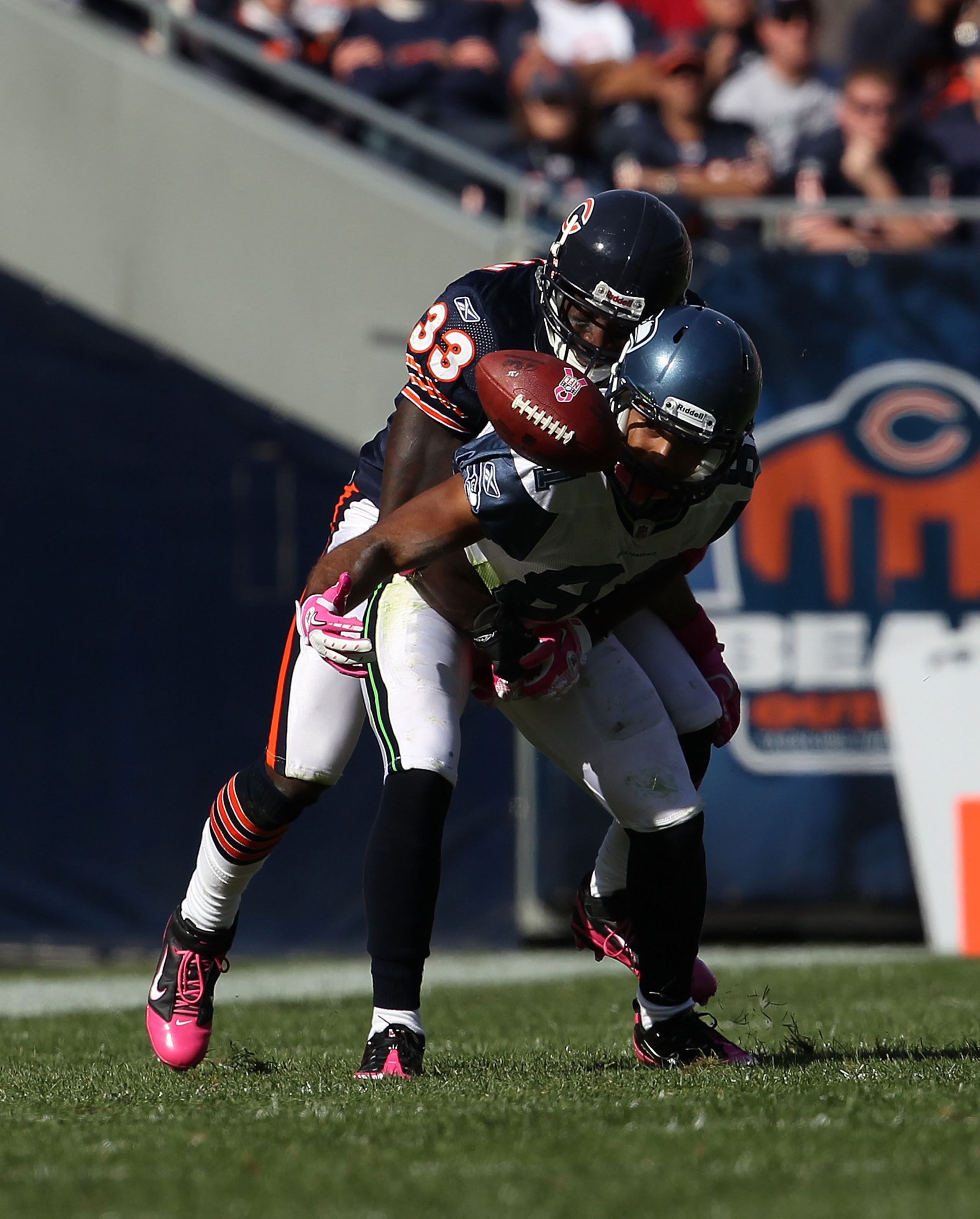 CHICAGO - OCTOBER 17: Charles Tillman #33 of the Chicago Bears breaks up a pass intended for Golden Tate #81 of the Seattle Seahawks at Soldier Field on October 17, 2010 in Chicago, Illinois. The Seahawks defeated the Bears 23-20. (Photo by Jonathan Danie