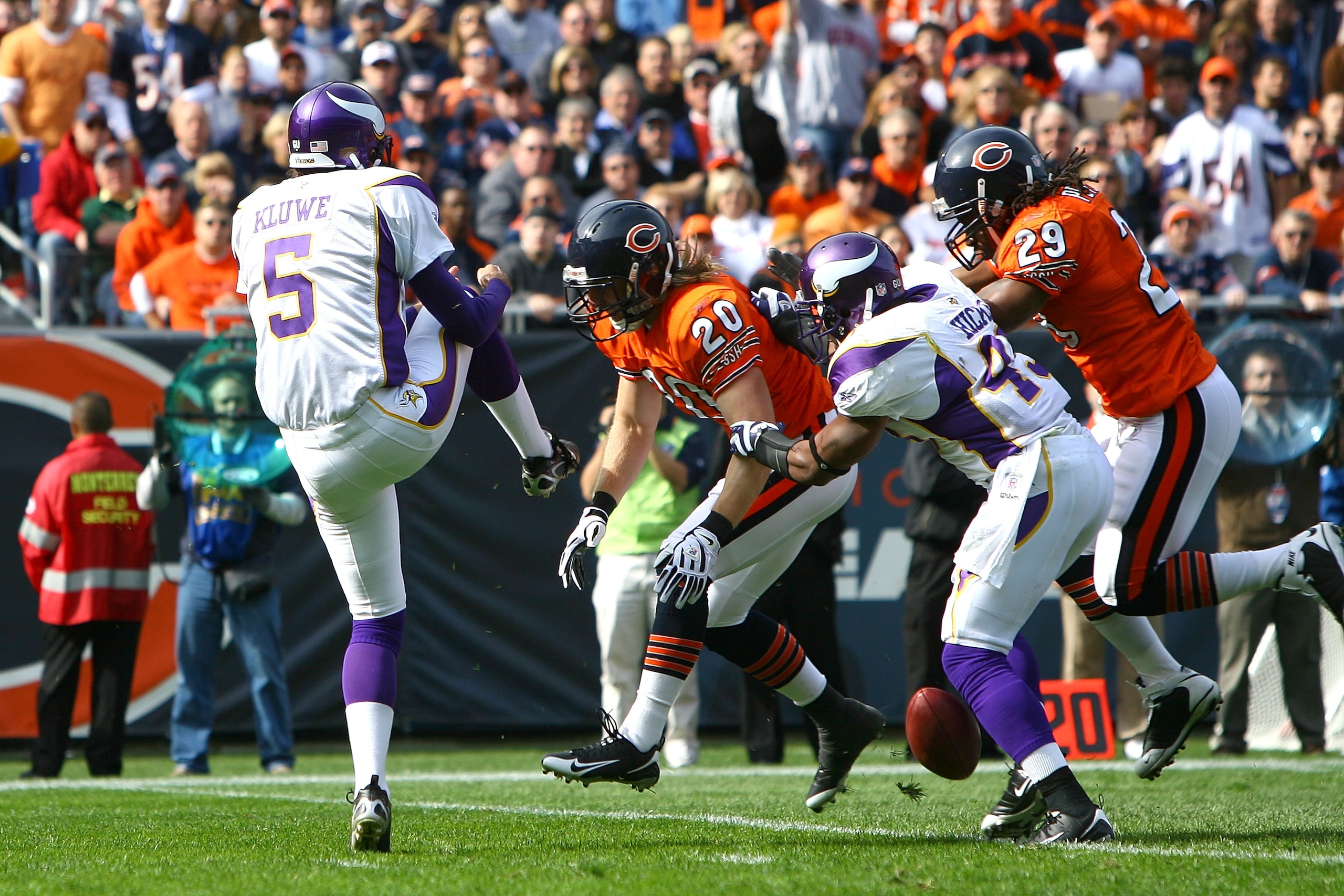 CHICAGO - OCTOBER 19:  Chris Kluwe #5 of the Minnesota Vikings has his punt blocked by Craig Steltz #20 of the Chicago Bears during the first quarter at Soldier Field on October 19, 2008 in Chicago, Illinois. Garrett Wolfe #25 of the Bears returned the ba