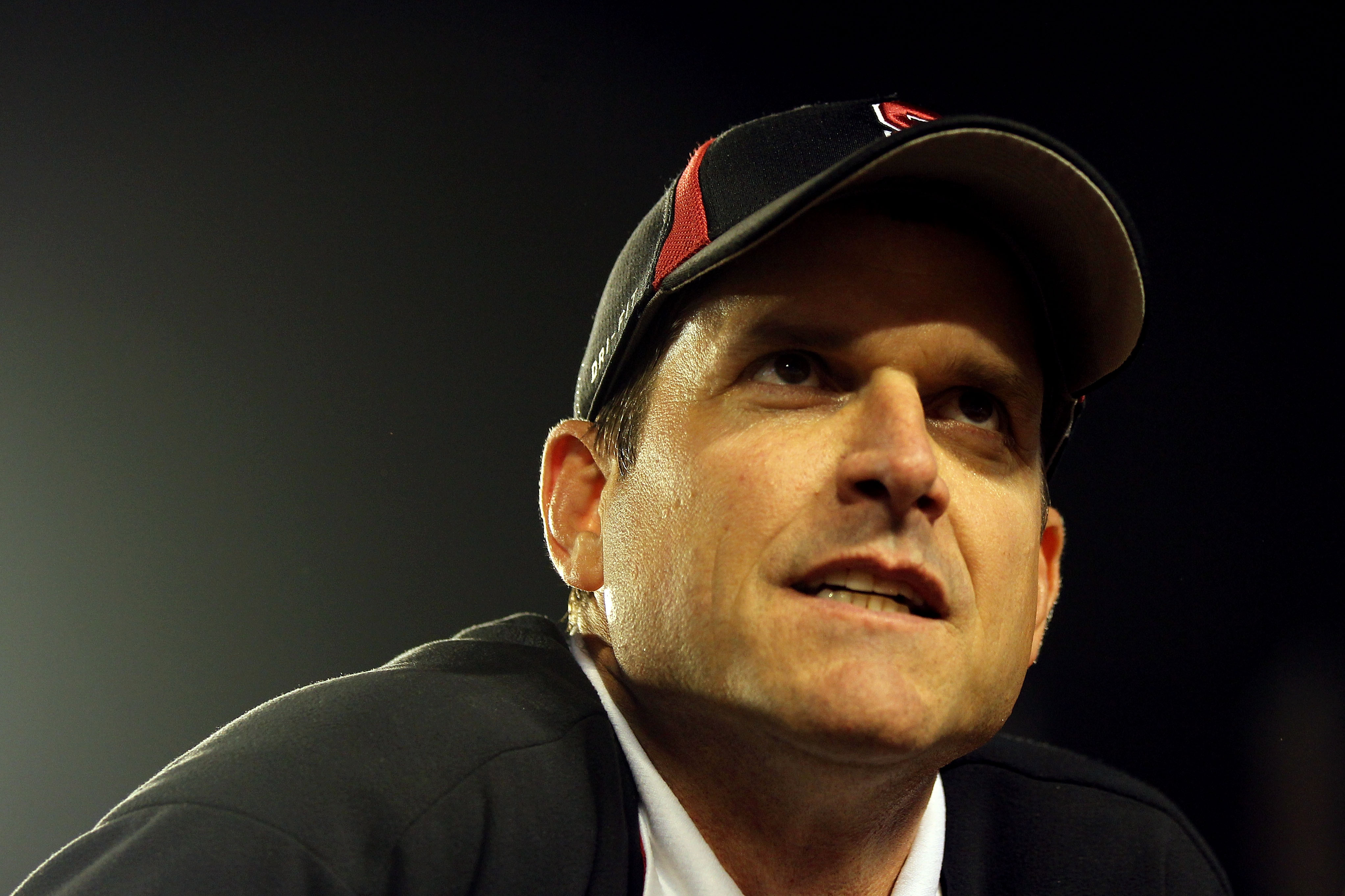 MIAMI, FL - JANUARY 03: Head coach Jim Harbaugh of the Stanford Cardinal looks on after Stanford won 40-12 against the Virginia Tech Hokies during the 2011 Discover Orange Bowl at Sun Life Stadium on January 3, 2011 in Miami, Florida. (Photo by Mike Ehrma