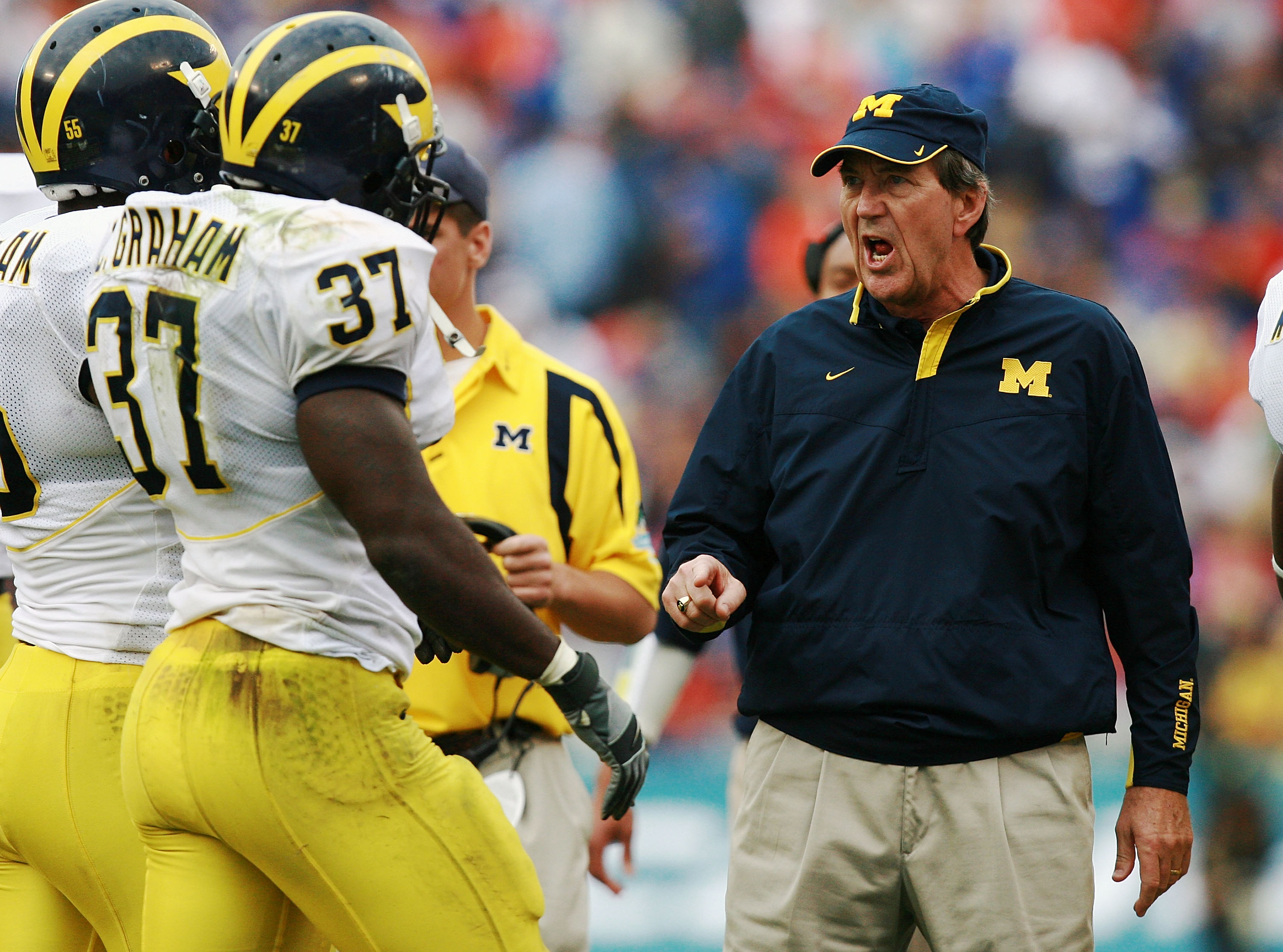 ORLANDO, FL - JANUARY 01: Head coach Lloyd Carr of the Michigan Wolverines yells toward his players during their victory over the Florida Gators in the Capital One Bowl at Florida Citrus Bowl on January 1, 2008 in Orlando, Florida. Michigan defeated Flor