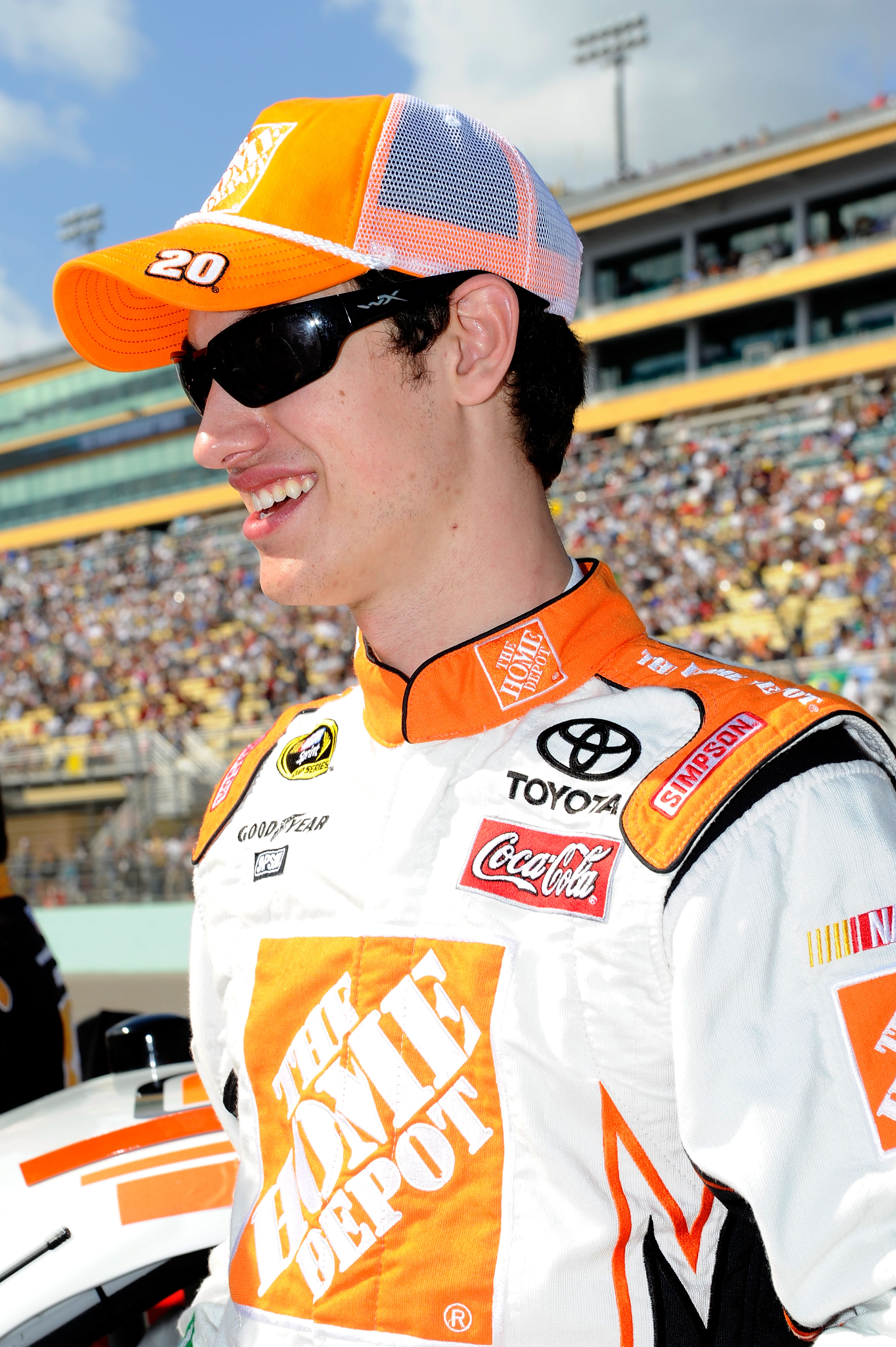 HOMESTEAD, FL - NOVEMBER 21:  Joey Logano, driver of the #20 Home Depot Toyota, stands on pit road prior to the NASCAR Sprint Cup Series Ford 400 at Homestead-Miami Speedway on November 21, 2010 in Homestead, Florida.  (Photo by John Harrelson/Getty Image
