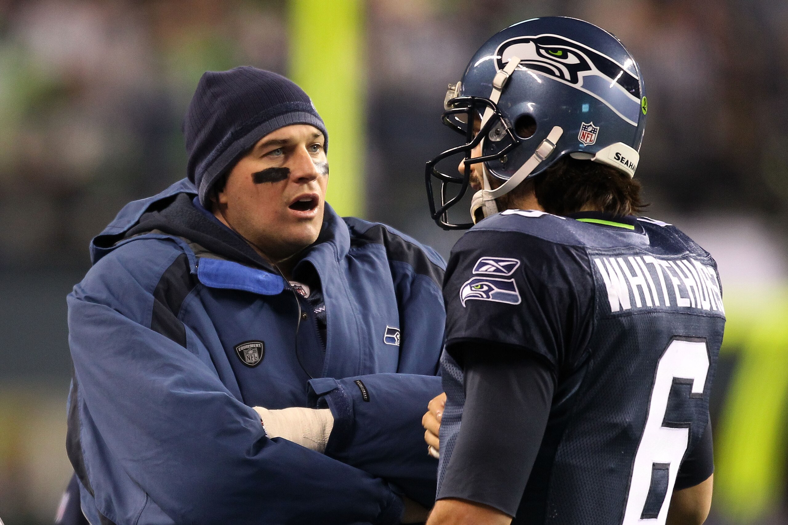 SEATTLE, WA - JANUARY 02: (L-R) Quarterbacks Matt Hasselbeck #8 and Charlie Whitehurst #6 of the Seattle Seahawks speak on the sidelines during their game against the St. Louis Rams at Qwest Field on January 2, 2011 in Seattle, Washington. (Photo by Ott SEATTLE, WA - JANUARY 02: (L-R) Quarterbacks Matt Hasselbeck #8 and Charlie Whitehurst #6 of the Seattle Seahawks speak on the sidelines during their game against the St. Louis Rams at Qwest Field on January 2, 2011 in Seattle, Washington. (Photo by Ott