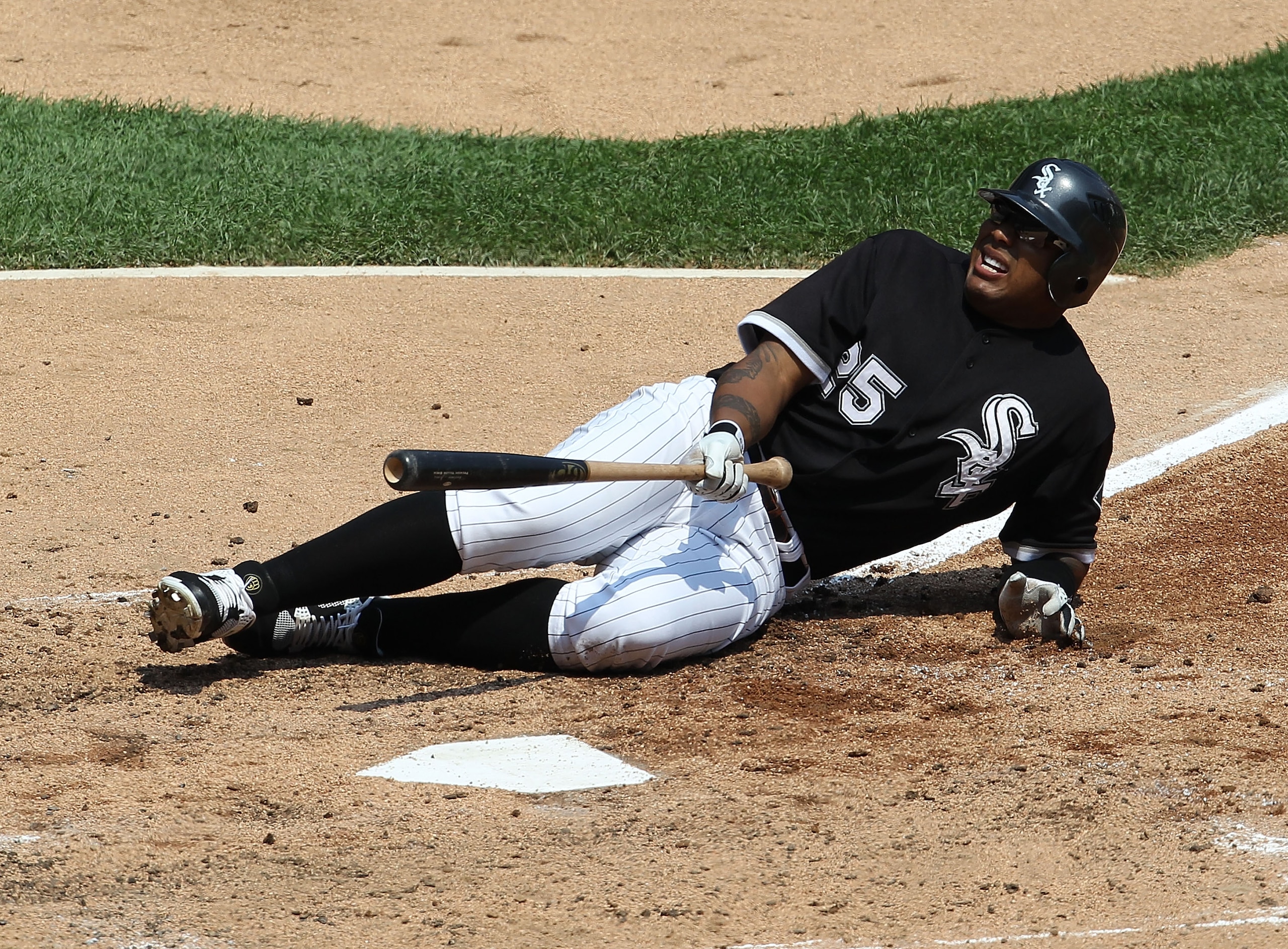 CHICAGO - AUGUST 01: Andruw Jones #25 of the Chicago White Sox hits the ground after being hit by a pitch from Gio Gonzalez of the Oakland Athletics at U.S. Cellular Field on August 1, 2010 in Chicago, Illinois. (Photo by Jonathan Daniel/Getty Images)