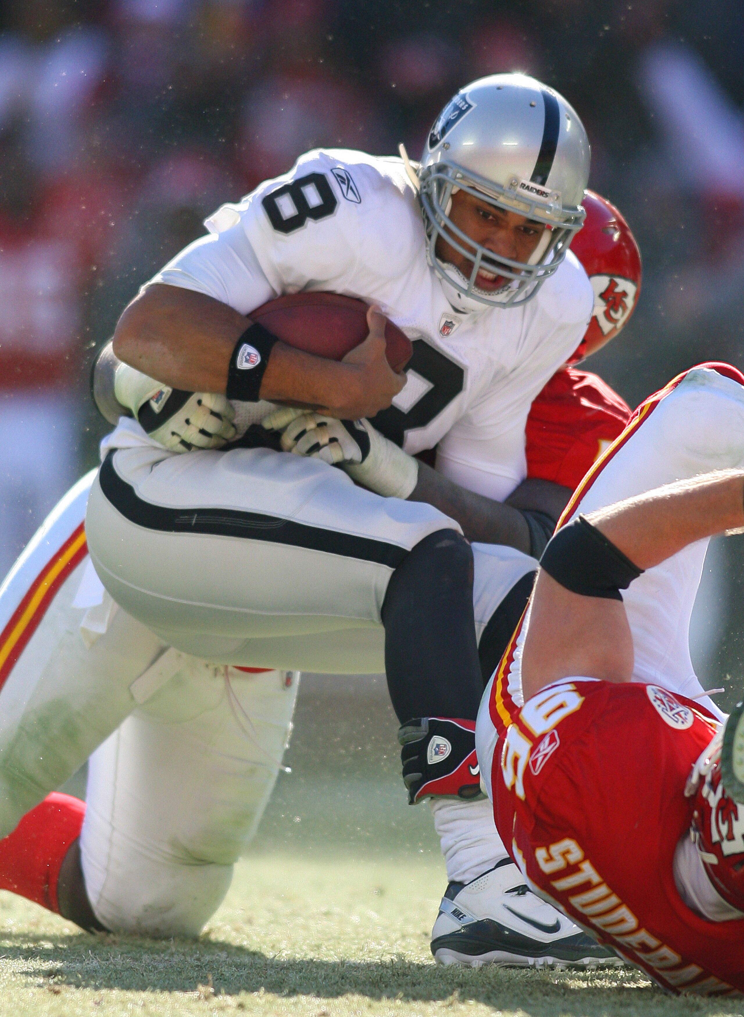 KANSAS CITY, MO - JANUARY 02: Quarterback Jason Campbell #8 of the Oakland Raiders is sacked in a game against the Kansas City Chiefs at Arrowhead Stadium on January 2, 2011 in Kansas City, Missouri. (Photo by Tim Umphrey/Getty Images) KANSAS CITY, MO - JANUARY 02: Quarterback Jason Campbell #8 of the Oakland Raiders is sacked in a game against the Kansas City Chiefs at Arrowhead Stadium on January 2, 2011 in Kansas City, Missouri. (Photo by Tim Umphrey/Getty Images)