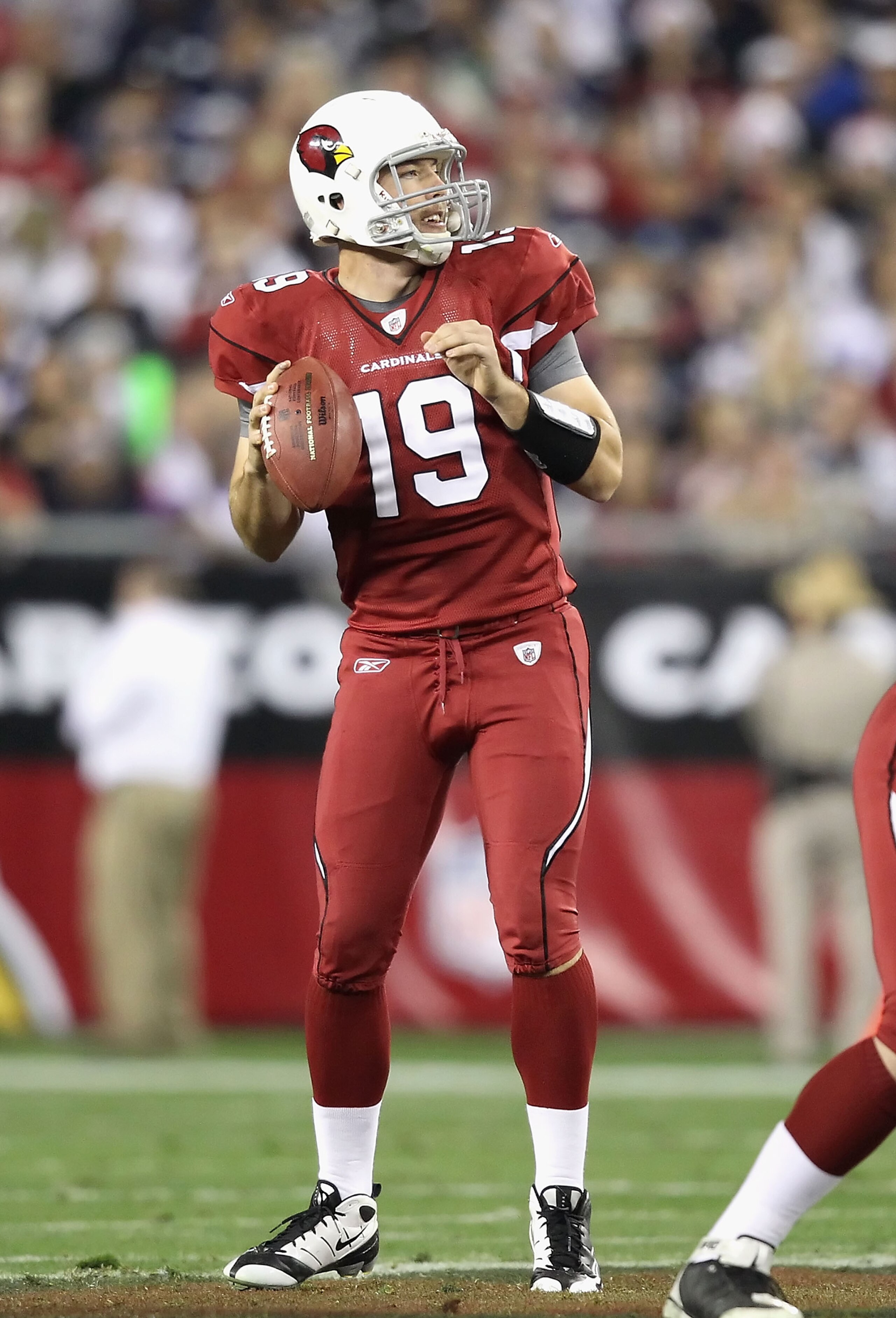 GLENDALE, AZ - DECEMBER 25: Quarterback John Skelton #19 of the Arizona Cardinals drops back to pass during the NFL game against the Dallas Cowboys at the University of Phoenix Stadium on December 25, 2010 in Glendale, Arizona. The Cardinals defeated the GLENDALE, AZ - DECEMBER 25: Quarterback John Skelton #19 of the Arizona Cardinals drops back to pass during the NFL game against the Dallas Cowboys at the University of Phoenix Stadium on December 25, 2010 in Glendale, Arizona. The Cardinals defeated the