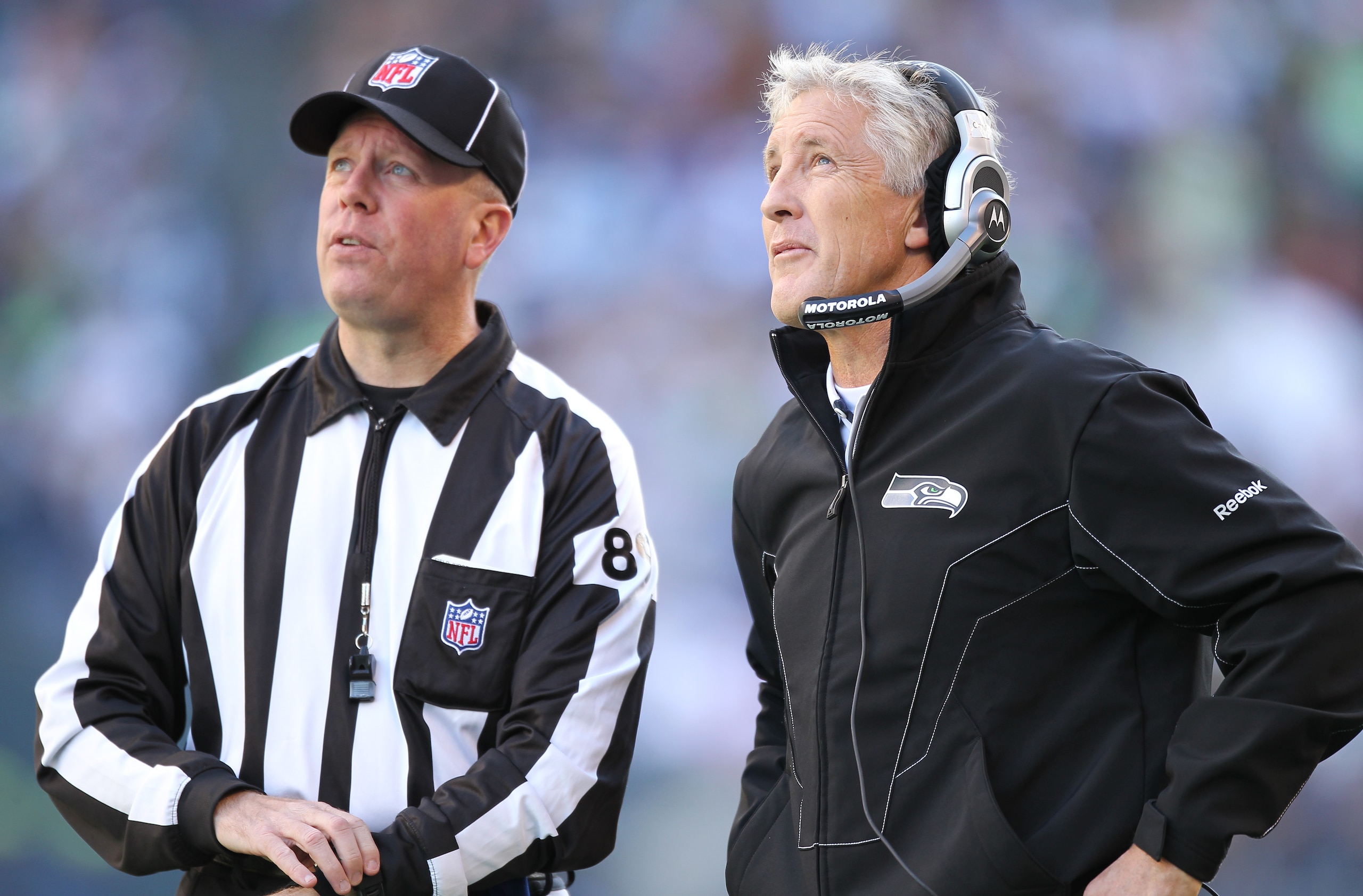 SEATTLE - NOVEMBER 07: Head coach Pete Carroll of the Seattle Seahawks looks at the scoreboard as he awaits the ruling on a challenge with Field Judge Jon Lucivansky during the game against the New York Giants at Qwest Field on November 7, 2010 in Seatt SEATTLE - NOVEMBER 07: Head coach Pete Carroll of the Seattle Seahawks looks at the scoreboard as he awaits the ruling on a challenge with Field Judge Jon Lucivansky during the game against the New York Giants at Qwest Field on November 7, 2010 in Seatt