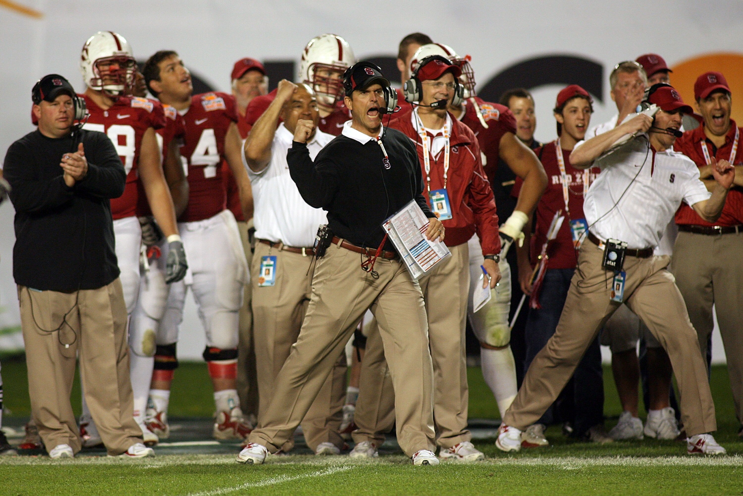 MIAMI, FL - JANUARY 03: Head coach Jim Harbaugh of the Stanford Cardinal reacts as he coaches against the Virginia Tech Hokies during the 2011 Discover Orange Bowl at Sun Life Stadium on January 3, 2011 in Miami, Florida. Stanford won 40-12. (Photo by Mar