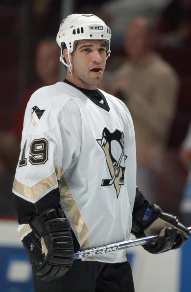 CHICAGO - OCTOBER 30:  Ramzi Abid #19 of the Pittsburgh Penguins looks on during warm up prior to a game against the Chicago Blackhawks on October 30, 2003 at the United Center in Chicago, Illinois.  The Penguins defeated the Blackhawks 1-0.   (Photo by J