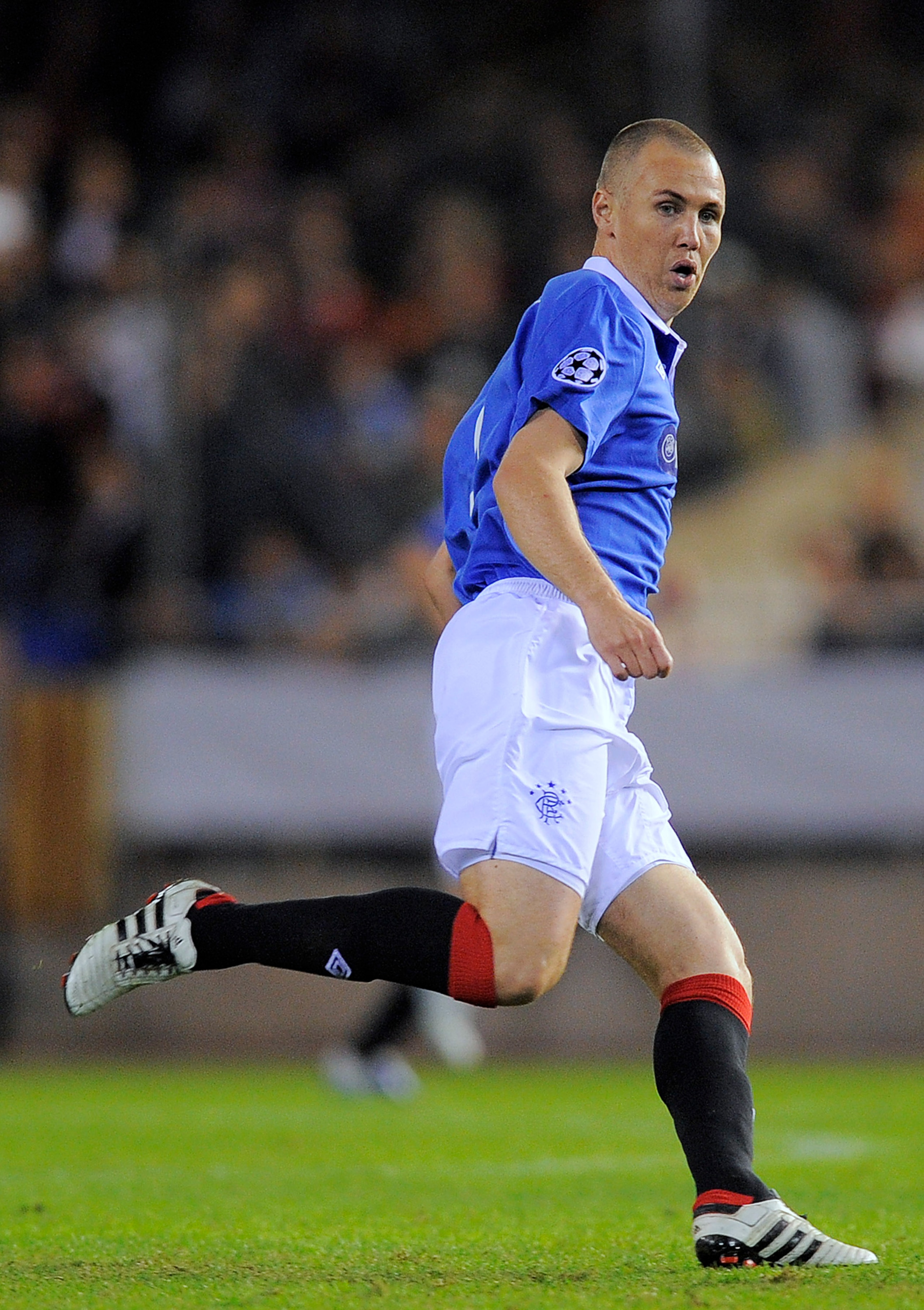 VALENCIA, SPAIN - NOVEMBER 02: Kenny Miller of Glasgow Rangers runs during their UEFA Champions League group C match between Valencia CF and Glasgow Rangers at the Mestalla Stadium on November 2, 2010 in Valencia, Spain. Valencia won the match 3-0. (Pho VALENCIA, SPAIN - NOVEMBER 02: Kenny Miller of Glasgow Rangers runs during their UEFA Champions League group C match between Valencia CF and Glasgow Rangers at the Mestalla Stadium on November 2, 2010 in Valencia, Spain. Valencia won the match 3-0. (Pho