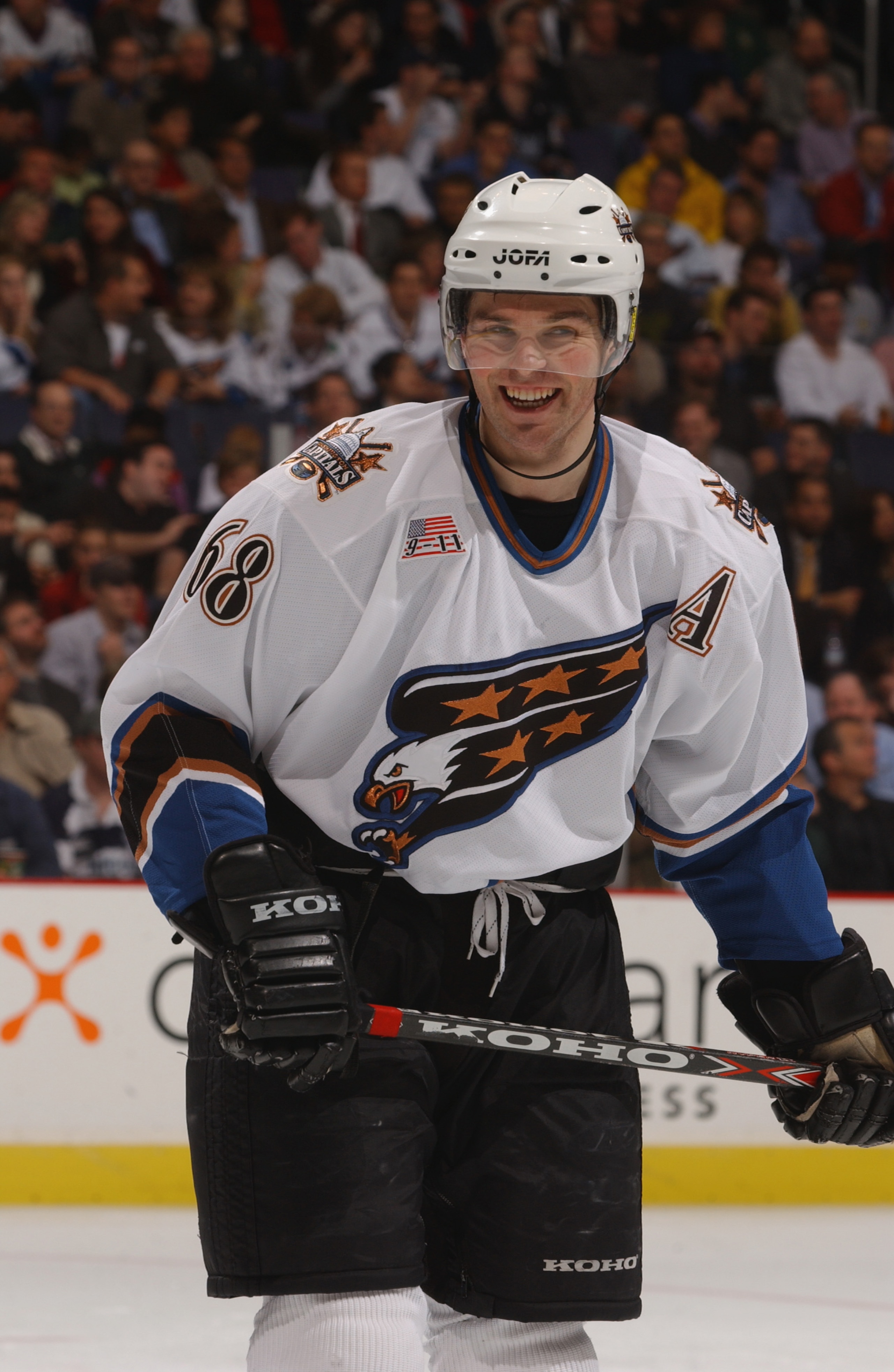 WASHINGTON - DECEMBER 4:  Right Wing Jaromir Jagr #88 of the Washington Capitals smiles on the ice against the New York Rangers during the NHL game at MCI Center in Washington, D.C. on December 4, 2001.  The Capitals defeated the Rangers 5-2. (Photo by Mi