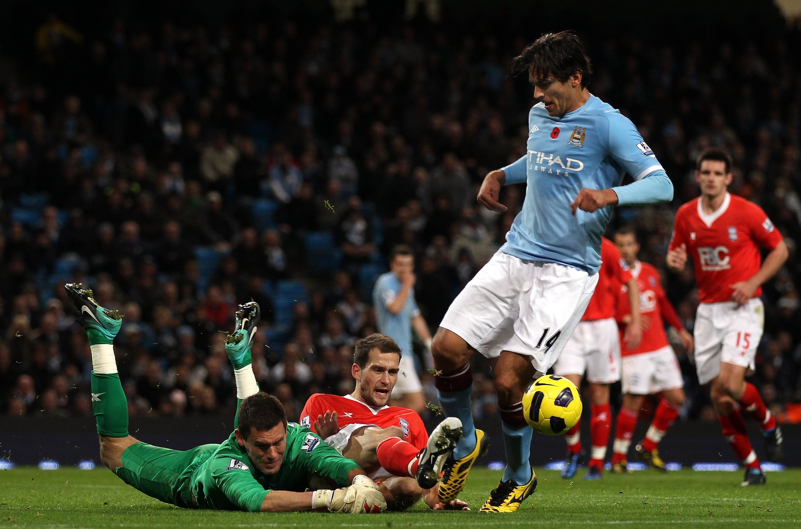 MANCHESTER, ENGLAND - NOVEMBER 13: Ben Foster and Roger Johnson of Birmingham City stop Roque Santa Cruz of Manchester City during the Barclays Premier League match between Manchester City and Birmingham City at City of Manchester Stadium on November 13, MANCHESTER, ENGLAND - NOVEMBER 13: Ben Foster and Roger Johnson of Birmingham City stop Roque Santa Cruz of Manchester City during the Barclays Premier League match between Manchester City and Birmingham City at City of Manchester Stadium on November 13,