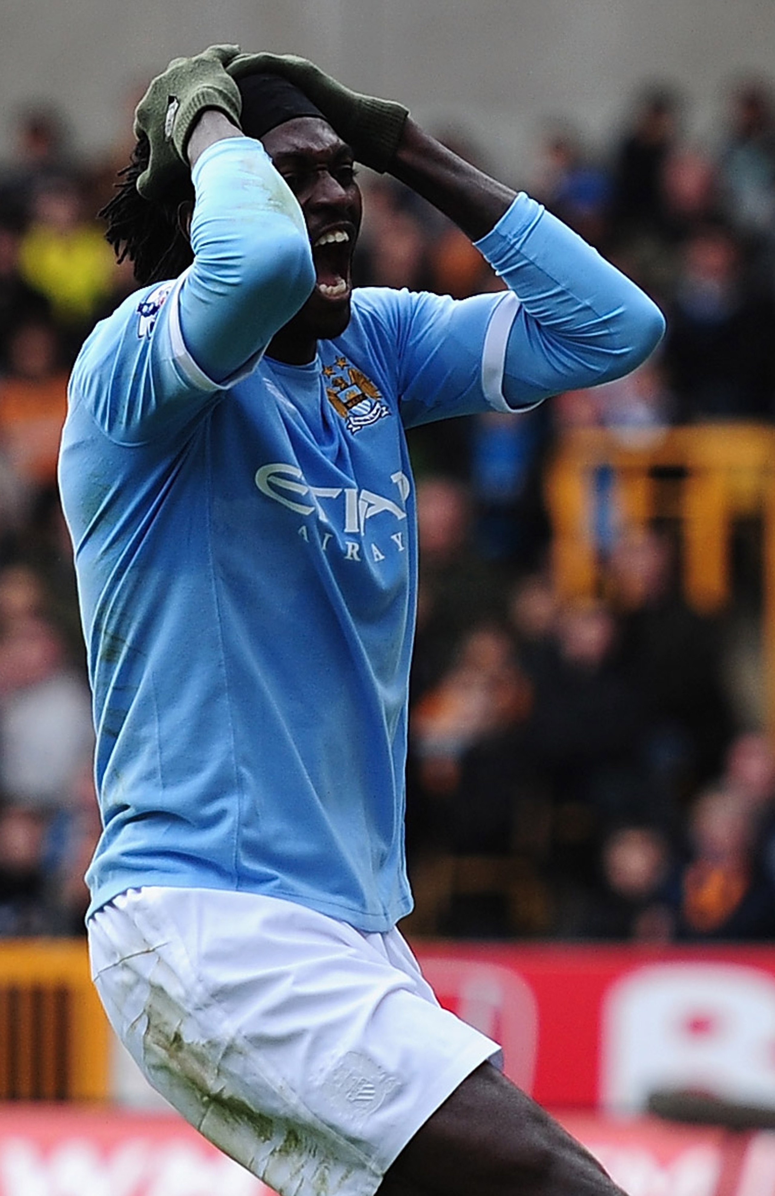 WOLVERHAMPTON, ENGLAND - OCTOBER 30: Emmanuel Adebayor of Manchester City battles shows his frustrations after a wasted chance during the Barclays Premier League match between Wolverhampton Wanderers and Manchester City at Molineux on October 30, 2010 in WOLVERHAMPTON, ENGLAND - OCTOBER 30: Emmanuel Adebayor of Manchester City battles shows his frustrations after a wasted chance during the Barclays Premier League match between Wolverhampton Wanderers and Manchester City at Molineux on October 30, 2010 in
