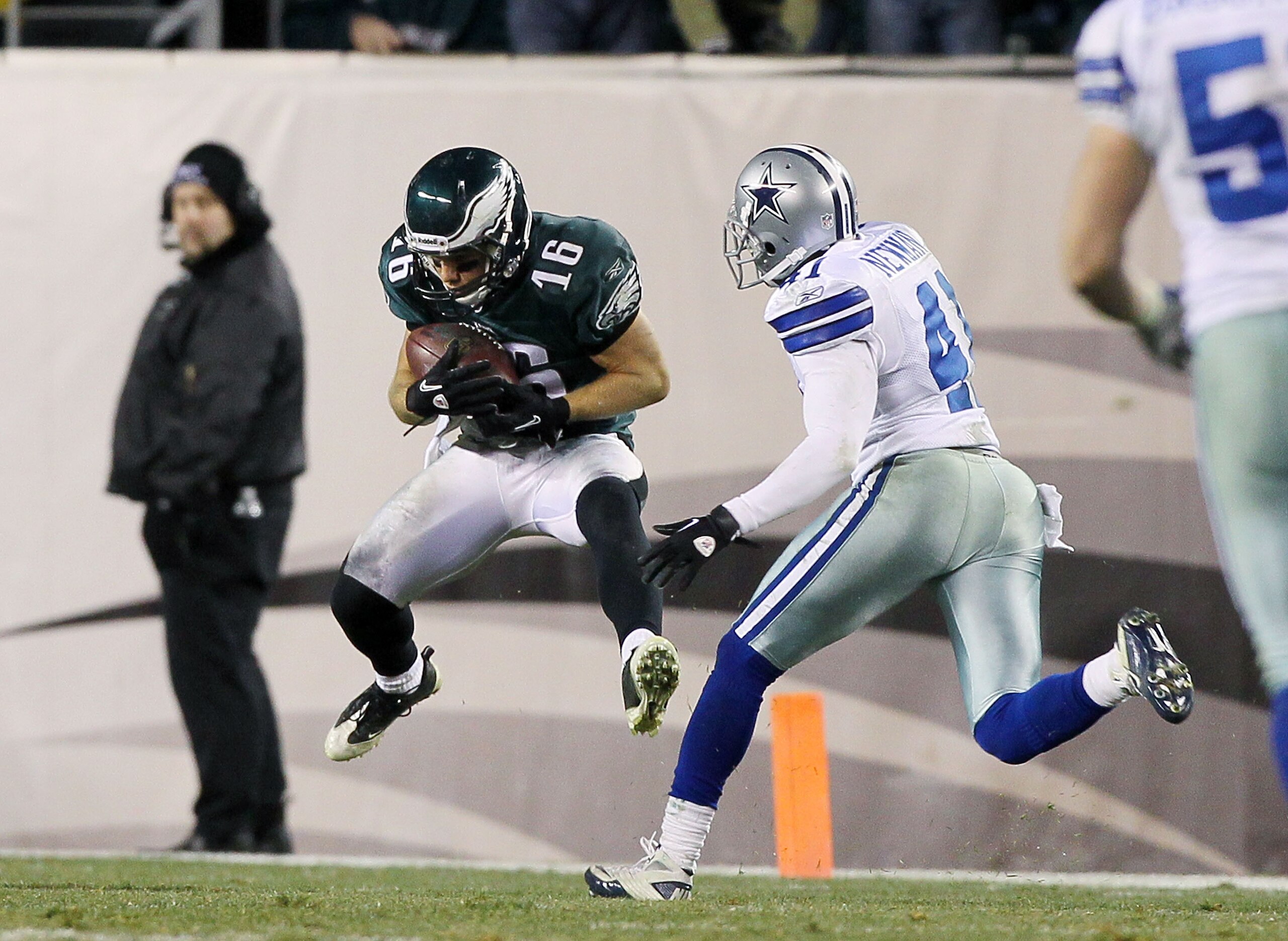 PHILADELPHIA, PA - JANUARY 02: Chad Hall #16 of the Philadelphia Eagles hauls in a long reception against Terence Newman #41 of the Dallas Cowboys on January 2, 2011 at Lincoln Financial Field in Philadelphia, Pennsylvania. The Cowboys defeated the Eagle PHILADELPHIA, PA - JANUARY 02: Chad Hall #16 of the Philadelphia Eagles hauls in a long reception against Terence Newman #41 of the Dallas Cowboys on January 2, 2011 at Lincoln Financial Field in Philadelphia, Pennsylvania. The Cowboys defeated the Eagle
