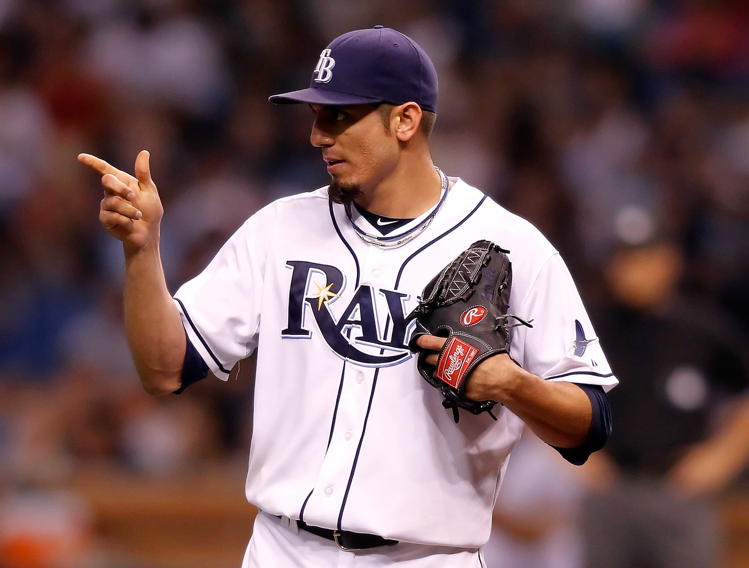 ST. PETERSBURG, FL - JULY 05:  Pitcher Matt Garza #22 of the Tampa Bay Rays acknowledges outfielder Carl Crawford #13 for his catch during the second inning against the Boston Red Sox at Tropicana Field on July 5, 2010 in St. Petersburg, Florida.  (Photo