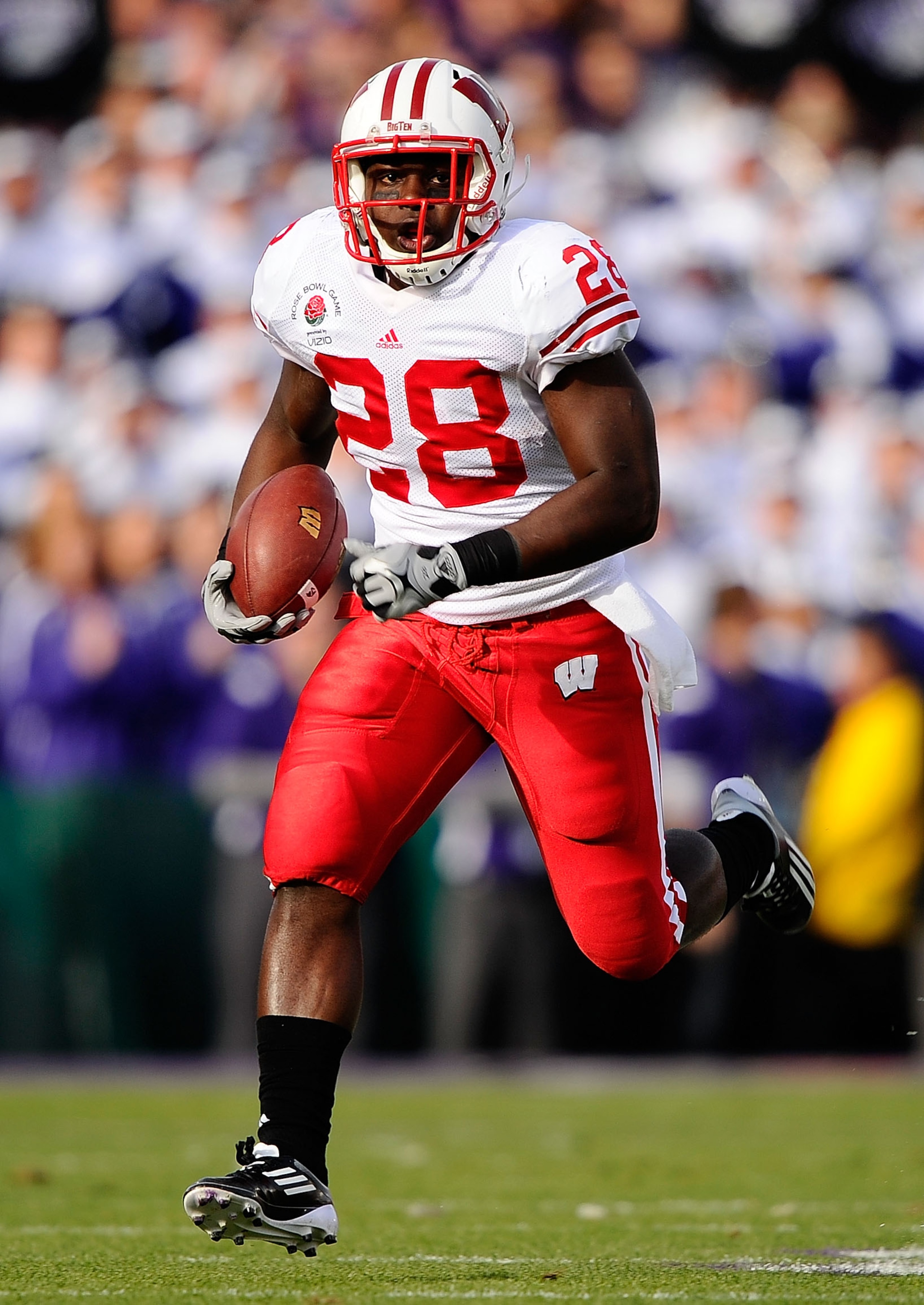 PASADENA, CA - JANUARY 01: Running back Montee Ball #28 of the Wisconsin Badgers rushes with the ball against the TCU Horned Frogs during the 97th Rose Bowl game on January 1, 2011 in Pasadena, California. (Photo by Kevork Djansezian/Getty Images) PASADENA, CA - JANUARY 01: Running back Montee Ball #28 of the Wisconsin Badgers rushes with the ball against the TCU Horned Frogs during the 97th Rose Bowl game on January 1, 2011 in Pasadena, California. (Photo by Kevork Djansezian/Getty Images)