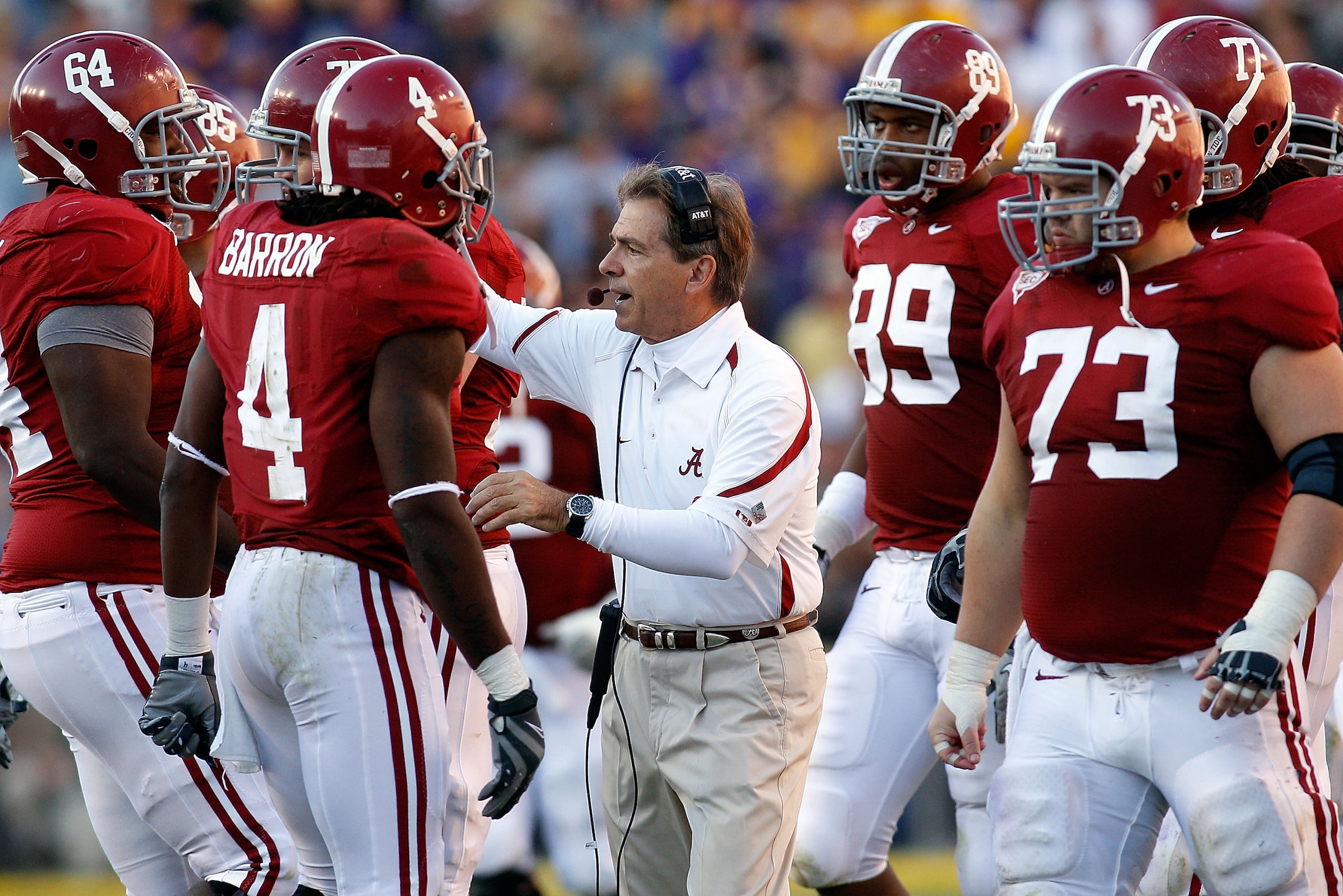 BATON ROUGE, LA - NOVEMBER 06: Head coach Nick Saban of the Alabama Crimson Tide talks with his team during the game against the Louisiana State University Tigers at Tiger Stadium on November 6, 2010 in Baton Rouge, Louisiana. The Tigers defeated the Cri BATON ROUGE, LA - NOVEMBER 06: Head coach Nick Saban of the Alabama Crimson Tide talks with his team during the game against the Louisiana State University Tigers at Tiger Stadium on November 6, 2010 in Baton Rouge, Louisiana. The Tigers defeated the Cri