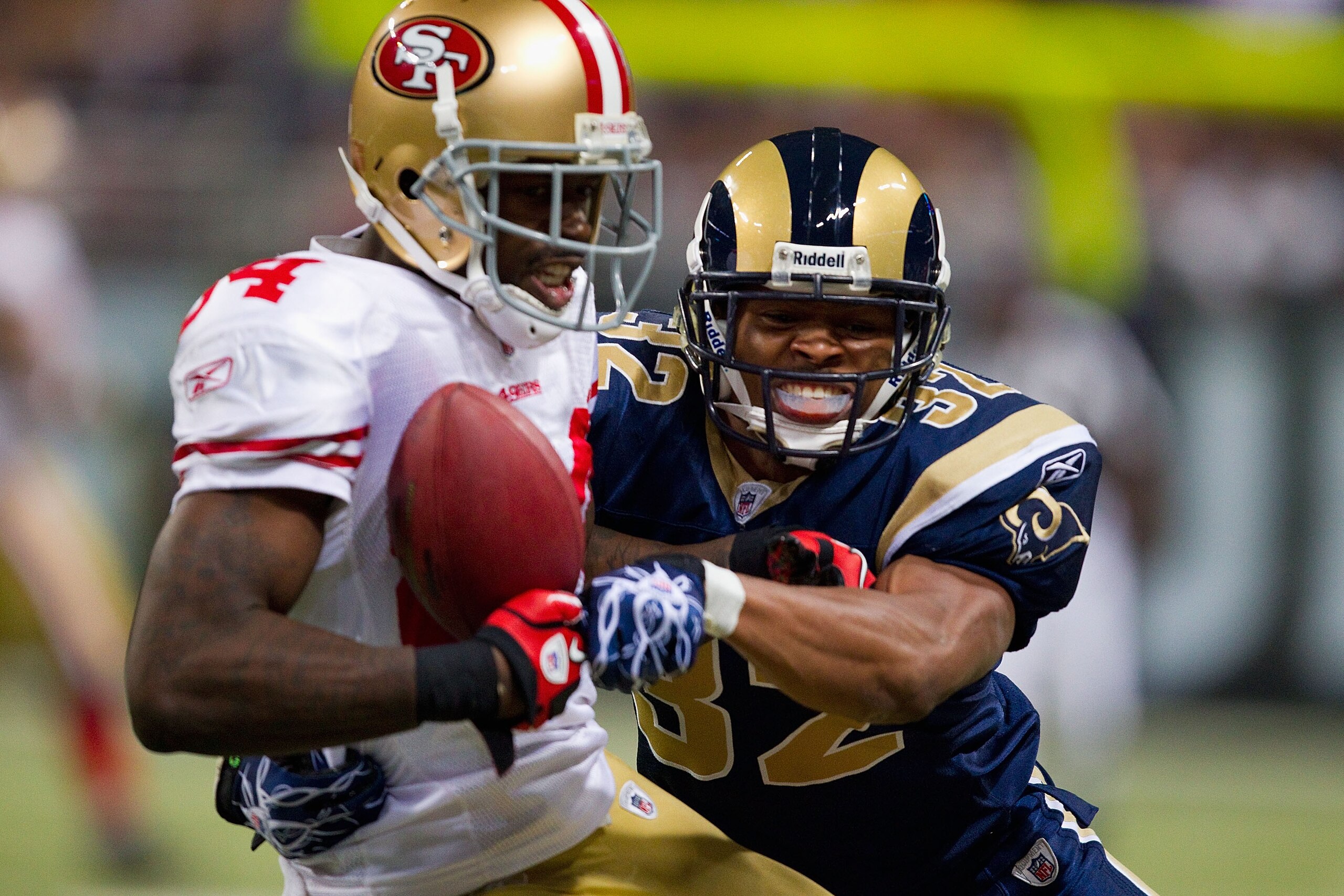 ST. LOUIS, MO - DECEMBER 26: Josh Morgan #84 of the San Francisco 49ers hauls in a pass against Bradley Fletcher #32 of the St. Louis Rams at the Edward Jones Dome on December 26, 2010 in St. Louis, Missouri. The Rams beat the 49ers 25-17. (Photo by Dilip ST. LOUIS, MO - DECEMBER 26: Josh Morgan #84 of the San Francisco 49ers hauls in a pass against Bradley Fletcher #32 of the St. Louis Rams at the Edward Jones Dome on December 26, 2010 in St. Louis, Missouri. The Rams beat the 49ers 25-17. (Photo by Dilip