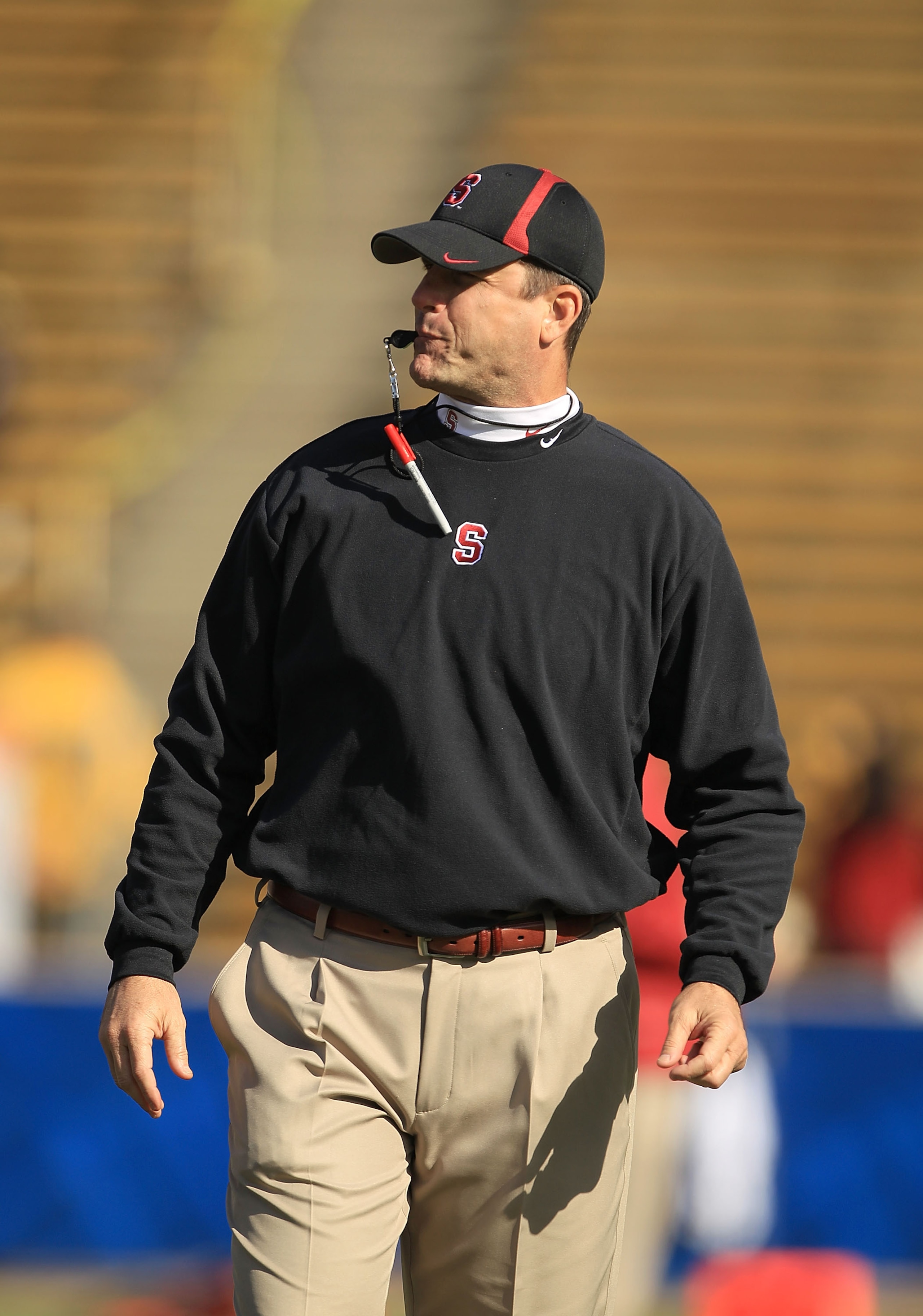 BERKELEY, CA - NOVEMBER 20:  Head coach Jim Harbaugh watches his team before their game against the California Golden Bears at California Memorial Stadium on November 20, 2010 in Berkeley, California.  (Photo by Ezra Shaw/Getty Images)