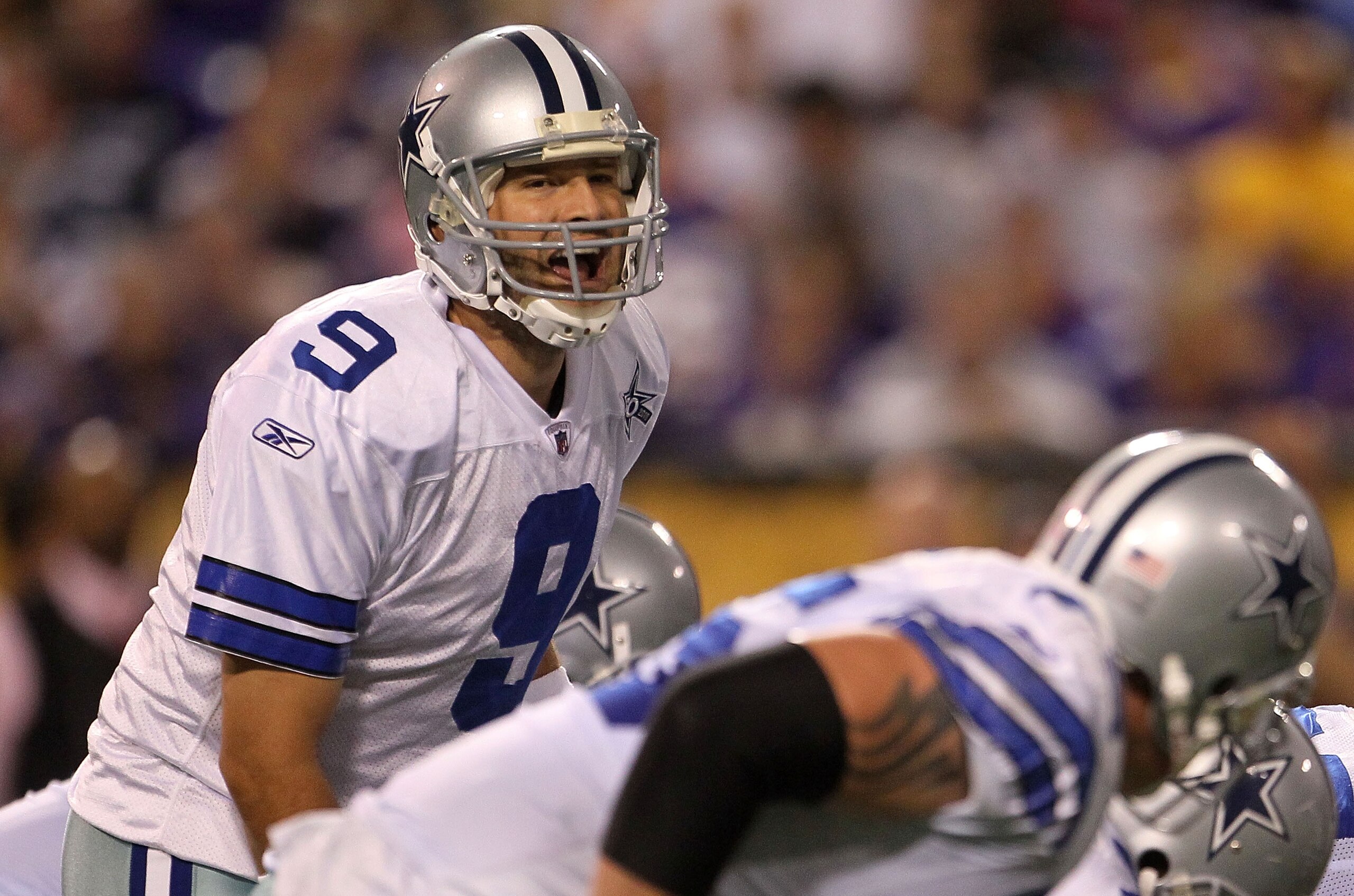 MINNEAPOLIS - OCTOBER 17: Quarterback Tony Romo #9 of the Dallas Cowboys calls a play against the Minnesota Vikings at Mall of America Field on October 17, 2010 in Minneapolis, Minnesota. (Photo by Jeff Gross/Getty Images) MINNEAPOLIS - OCTOBER 17: Quarterback Tony Romo #9 of the Dallas Cowboys calls a play against the Minnesota Vikings at Mall of America Field on October 17, 2010 in Minneapolis, Minnesota. (Photo by Jeff Gross/Getty Images)
