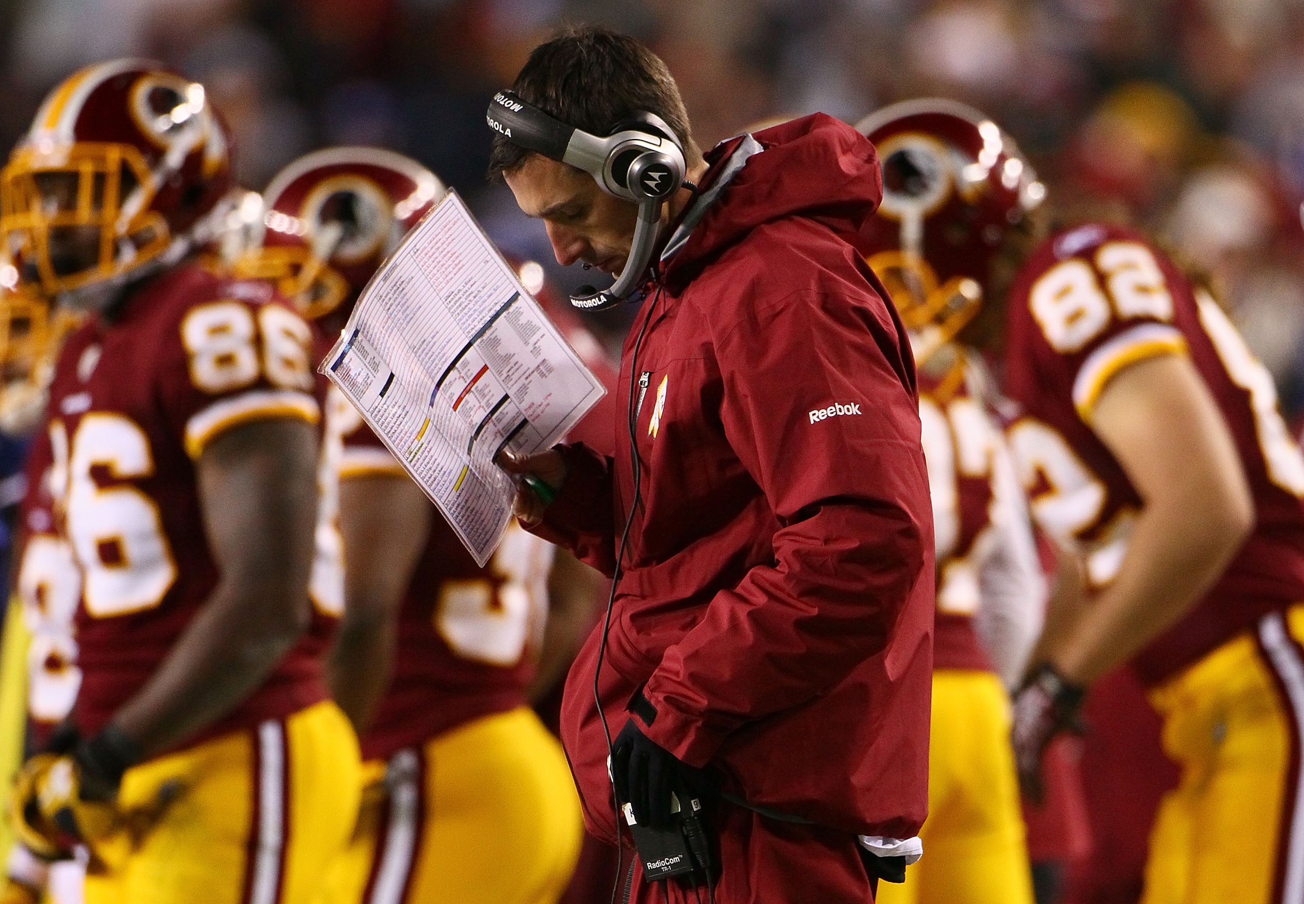 LANDOVER, MD - JANUARY 02: Washington Redskins offensive coordinator Kyle Shanahan works in the sideline in the fourth quarter of a game against the New York Giants at FedEx Field on January 2, 2011 in Landover, Maryland. The Giants won the game 17-14. LANDOVER, MD - JANUARY 02: Washington Redskins offensive coordinator Kyle Shanahan works in the sideline in the fourth quarter of a game against the New York Giants at FedEx Field on January 2, 2011 in Landover, Maryland. The Giants won the game 17-14.