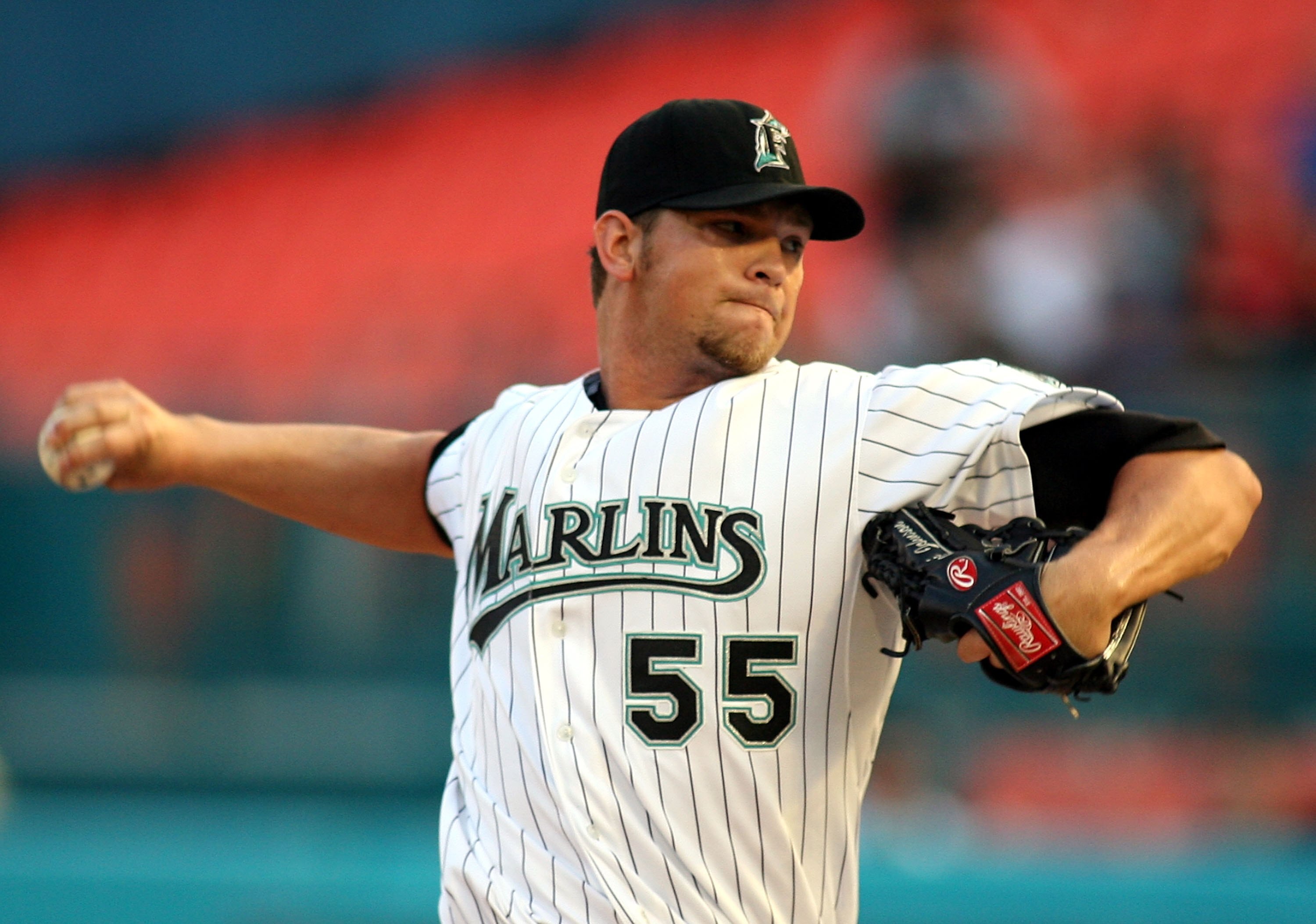 MIAMI - JULY 30:  Pitcher Josh Johnson #55 of the Florida Marlins throws during the second inning against  the New York Mets on July 30, 2008 at Dolphin Stadium in Miami, Florida.  The Marlins defeated the Mets 7-4.  (Photo by Marc Serota/Getty Images)