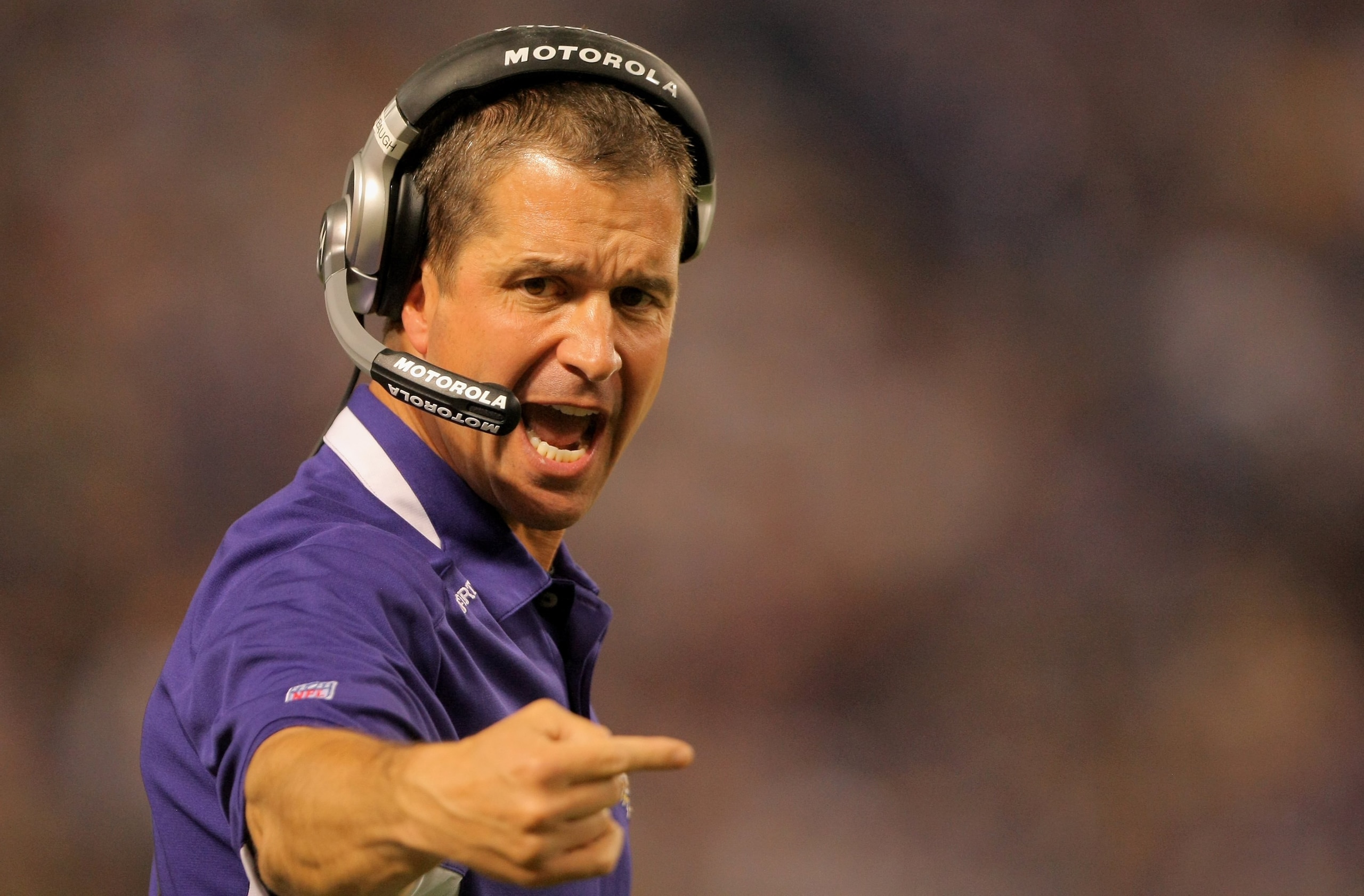 MINNEAPOLIS - OCTOBER 18:  Head coach John Harbaugh of the Baltimore Ravens leads his team against the Minnesota Vikings during NFL action at Hubert H. Humphrey Metrodome on October 18, 2009 in Minneapolis, Minnesota. The Vikings defeated the Ravens 33-31
