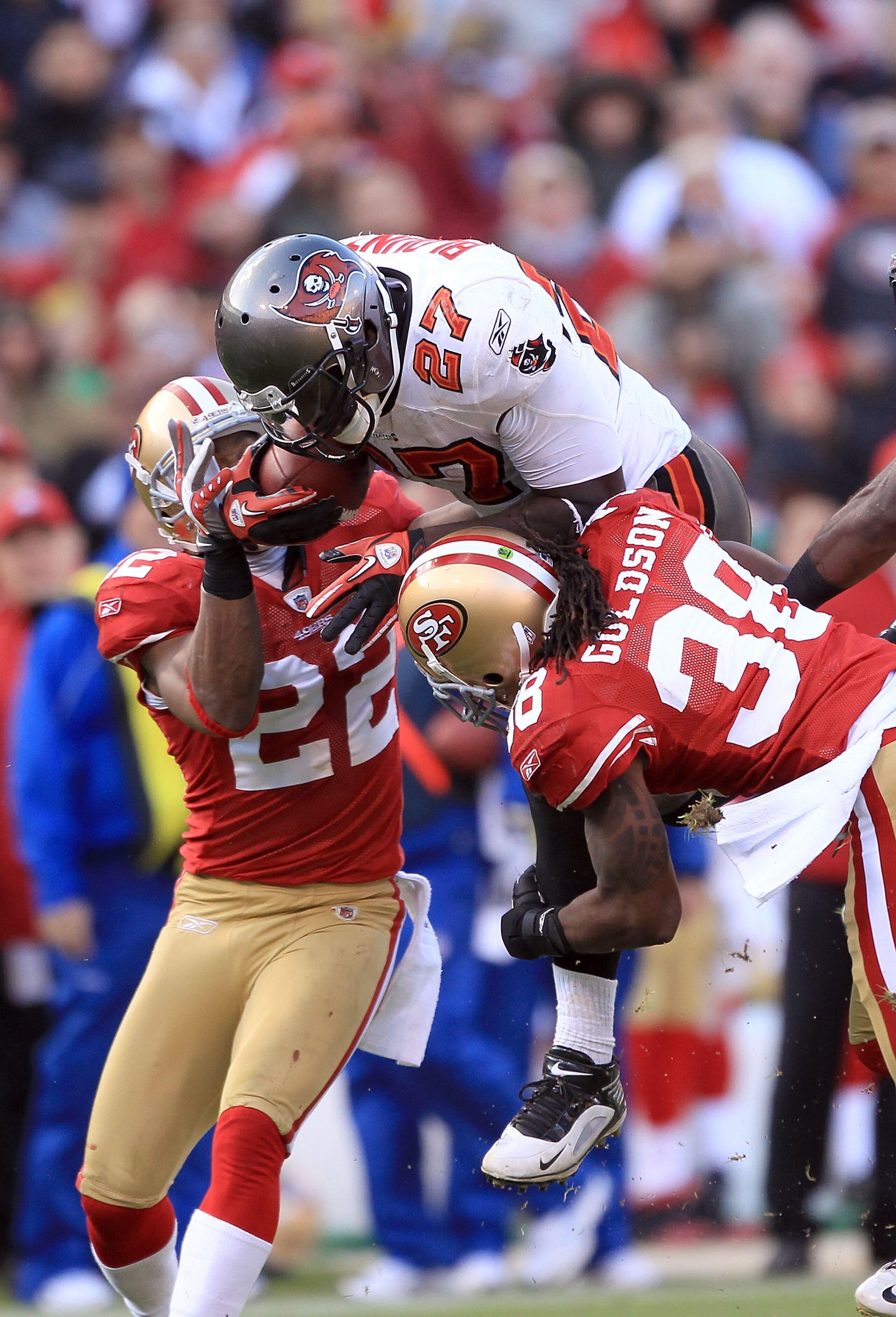 SAN FRANCISCO - NOVEMBER 21: LeGarrette Blount #27 of the Tampa Bay Buccaneers is hit by Dashon Goldson #38 and Nate Clements #22 of the San Francisco 49ers at Candlestick Park on November 21, 2010 in San Francisco, California. (Photo by Ezra Shaw/Getty SAN FRANCISCO - NOVEMBER 21: LeGarrette Blount #27 of the Tampa Bay Buccaneers is hit by Dashon Goldson #38 and Nate Clements #22 of the San Francisco 49ers at Candlestick Park on November 21, 2010 in San Francisco, California. (Photo by Ezra Shaw/Getty