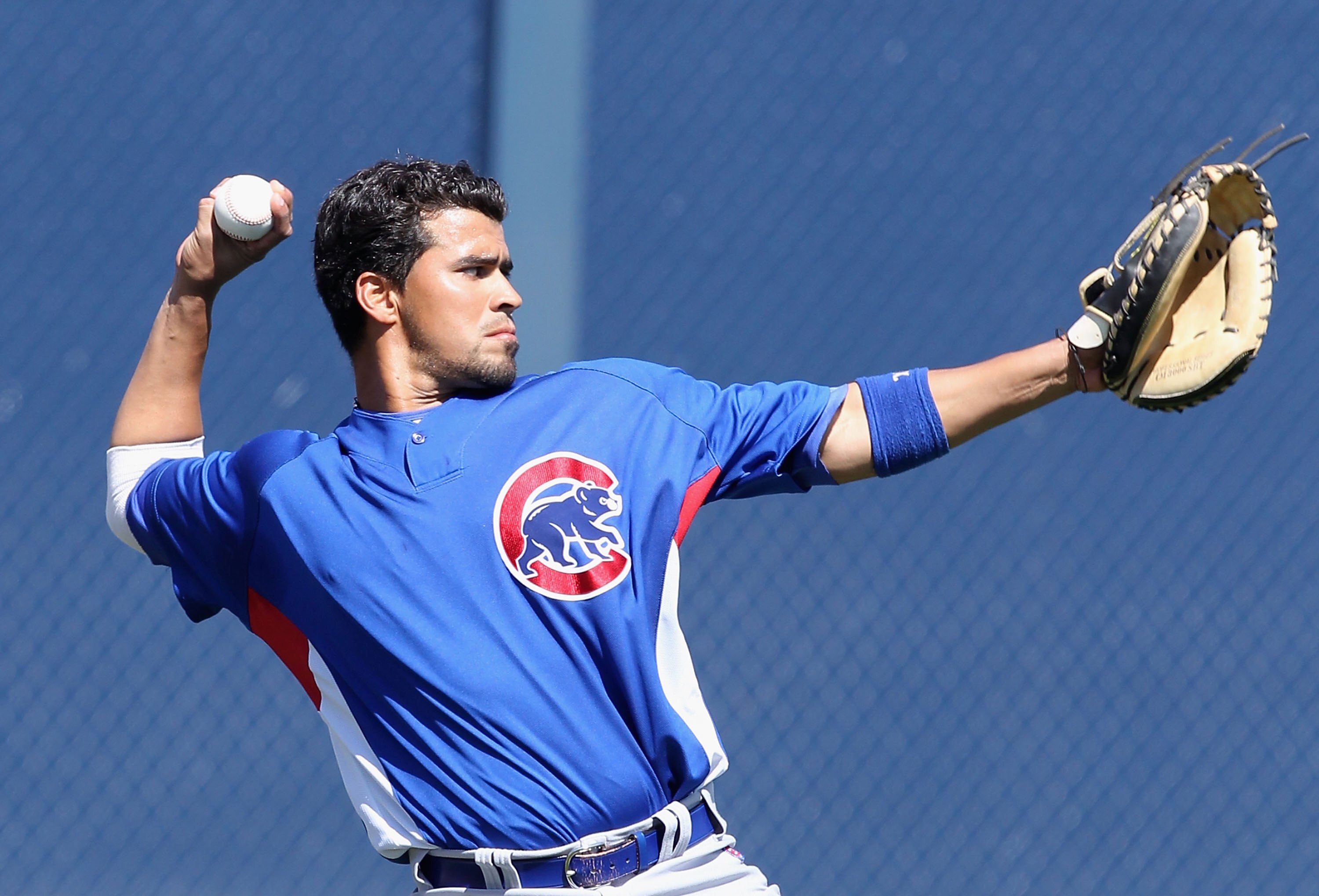 PEORIA, AZ - MARCH 11:  Catcher Robinson Chirinos #71 of the Chicago Cubs warms up before the MLB spring training game against the San Diego Padres at Peoria Stadium on March 11, 2010 in Peoria, Arizona. The Cubs defeated the Padres 8-7.  (Photo by Christ
