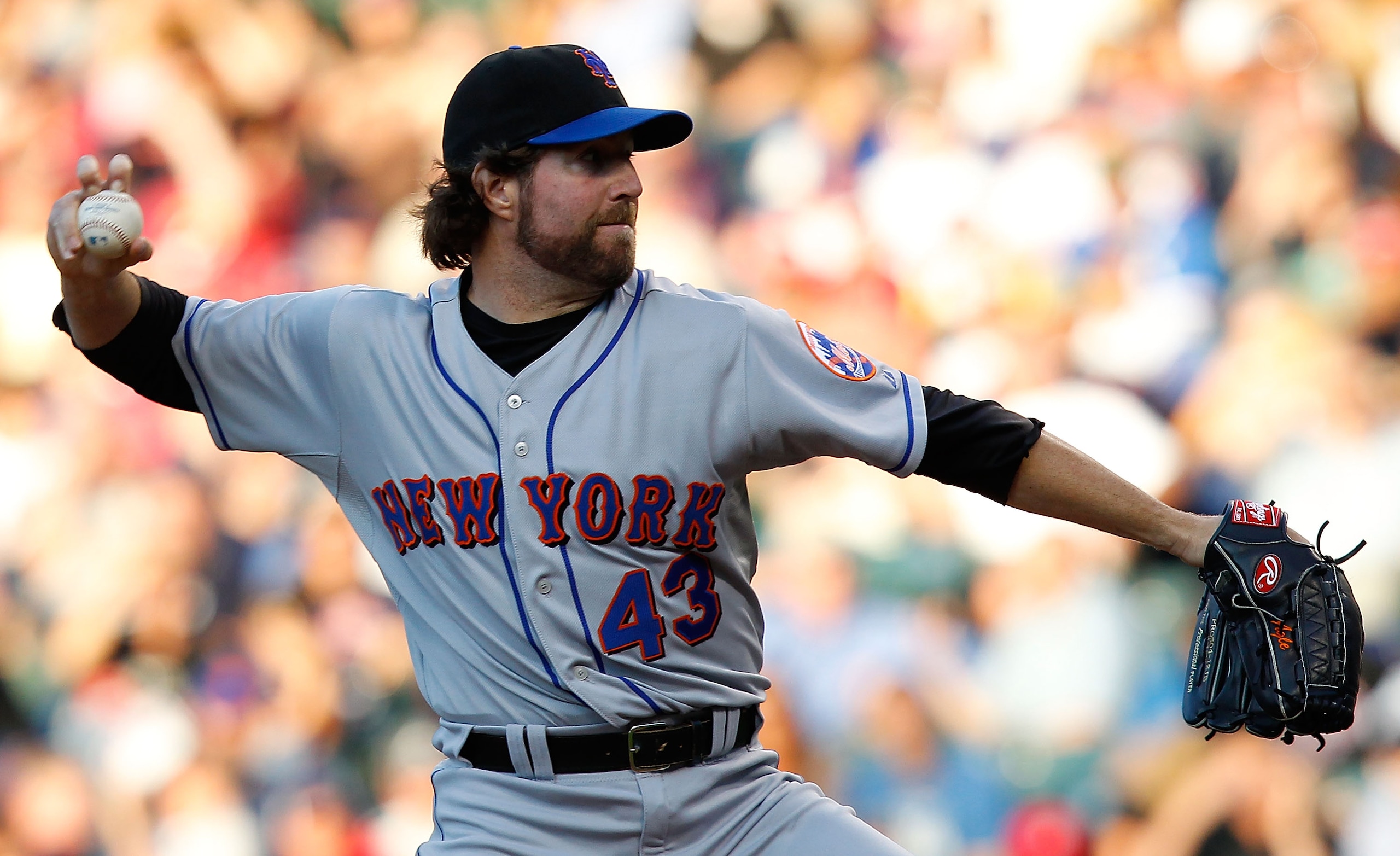CLEVELAND - JUNE 17:  R.A. Dickey #43 of the New York Mets pitches against the Cleveland Indians during the game on June 17, 2010 at Progressive Field in Cleveland, Ohio.  (Photo by Jared Wickerham/Getty Images)