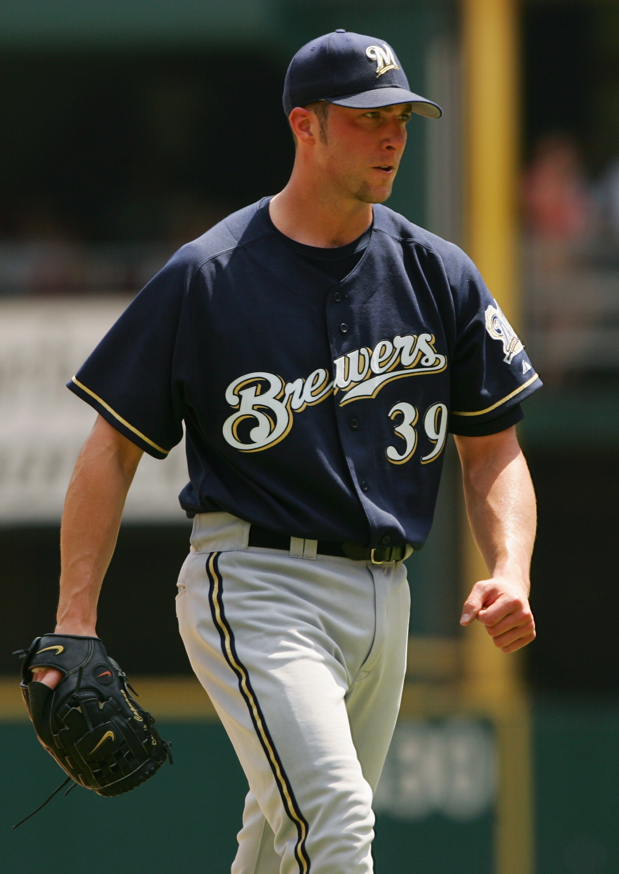 ST. LOUIS - JULY 21:  Pitcher Chris Capuano #39 of the Milwaukee Brewers walks across the field during the MLB game against the St. Louis Cardinals on July 21, 2005 at Busch Stadium in St. Louis, Missouri. The Brewers defeated the St. Louis Cardinals 12-7