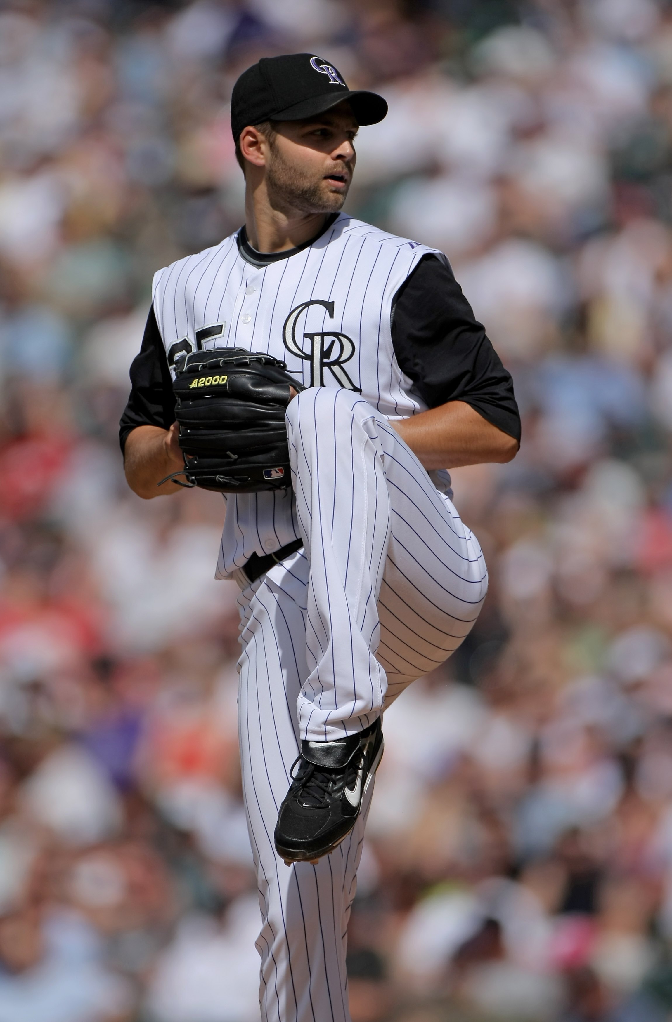 DENVER - MAY 18:  Pitcher Taylor Buchholz #35 of the Colorado Rockies delivers against the Minnesota Twins during Interleague MLB action at Coors Field on May 18, 2008 in Denver, Colorado. The Rockies defeated the Twins 6-2.  (Photo by Doug Pensinger/Gett