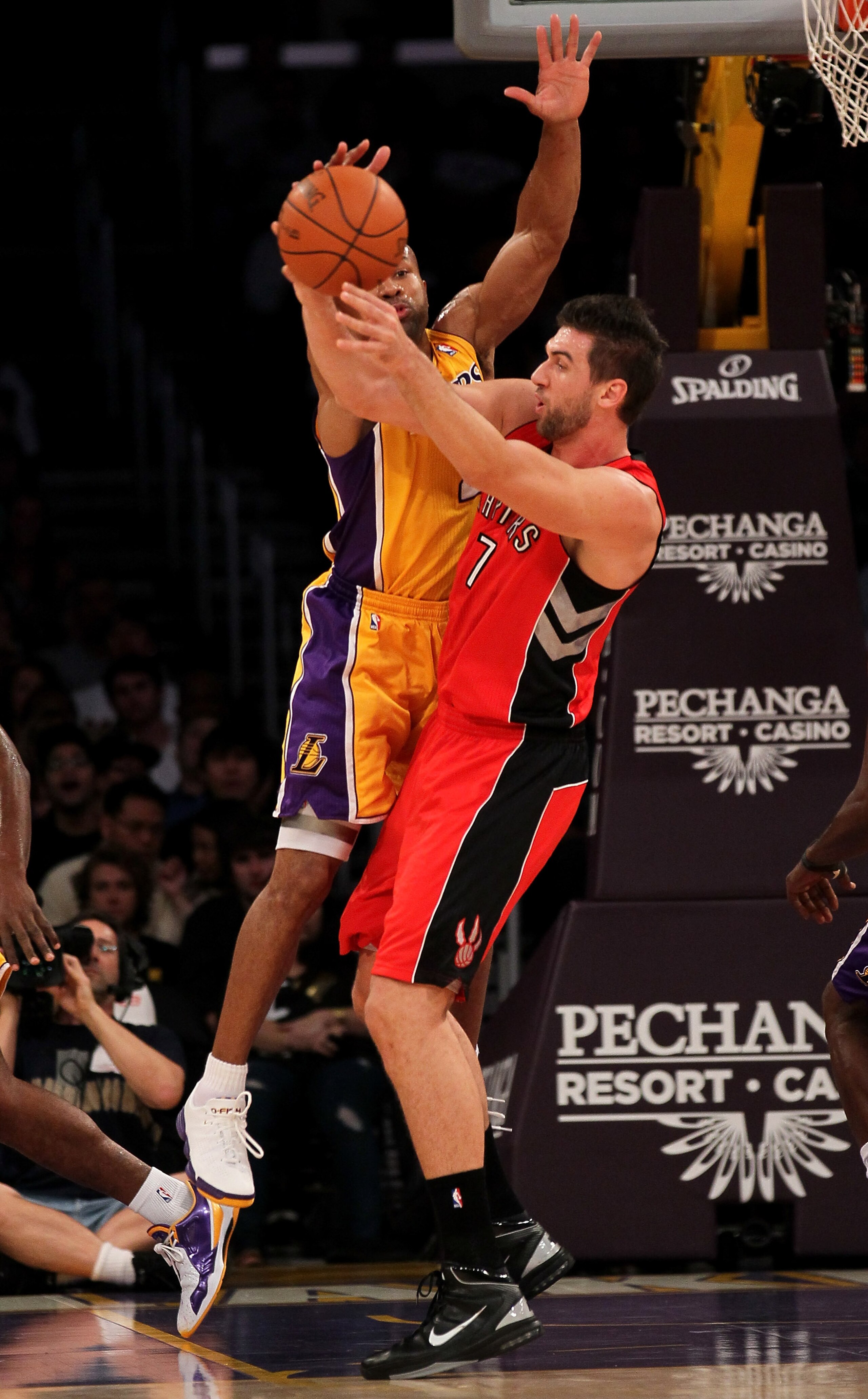 LOS ANGELES - NOVEMBER 5:  Derek Fisher #2 of the Los Angeles Lakers strips the ball from Andrea Bargnani #7 of the Toronto Raptors at Staples Center on November 5, 2010 in Los Angeles, California.  The Lakers won 108-102.   NOTE TO USER: User expressly a